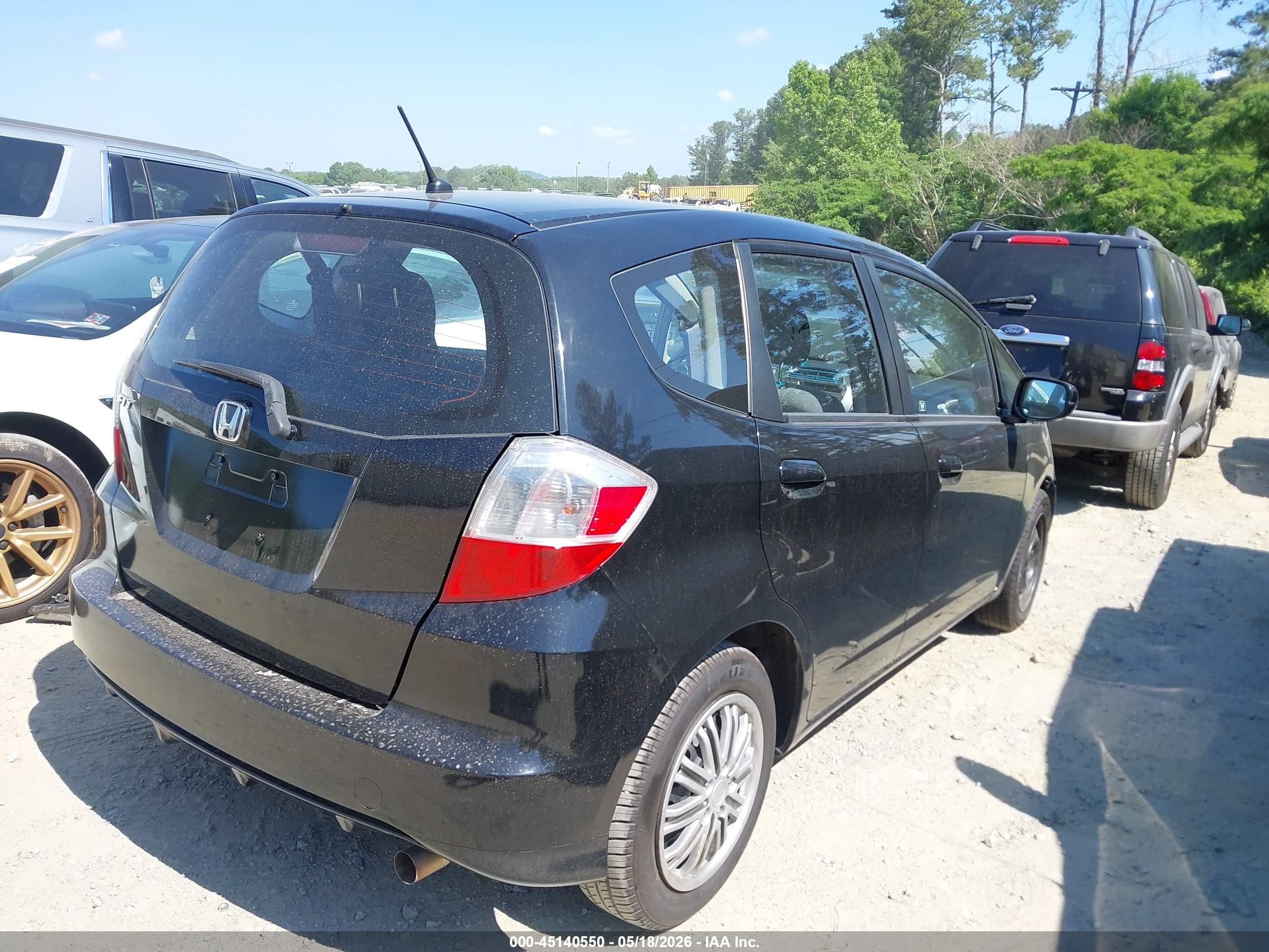 2013 Honda Fit   Black vin: JHMGE8H33DC028634
