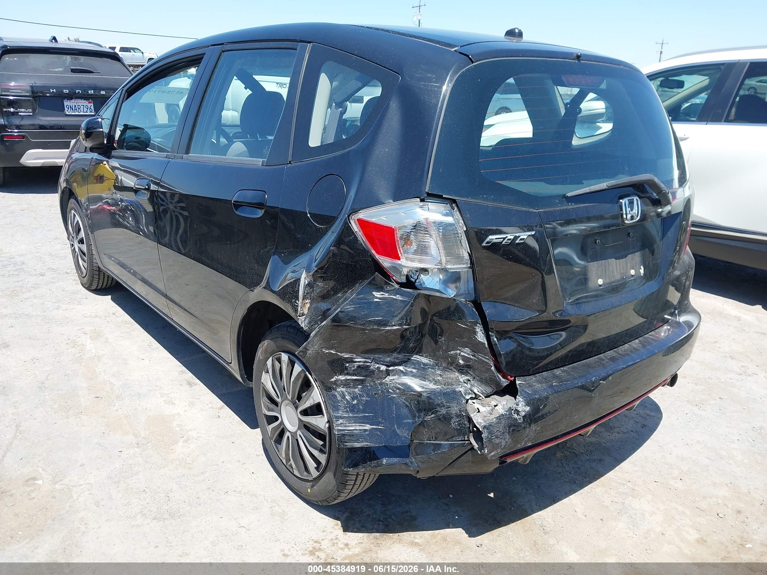 2013 Honda Fit   Black vin: JHMGE8H33DC048673