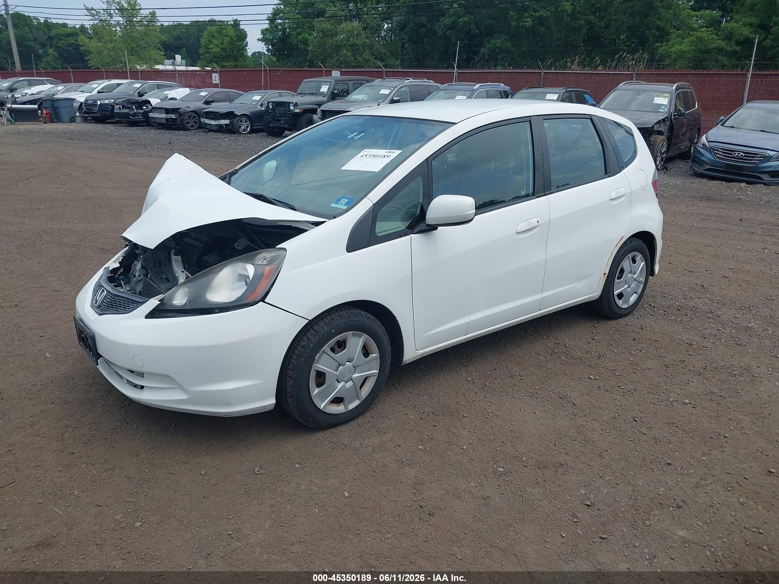 2012 Honda Fit   White vin: JHMGE8H34CC020377