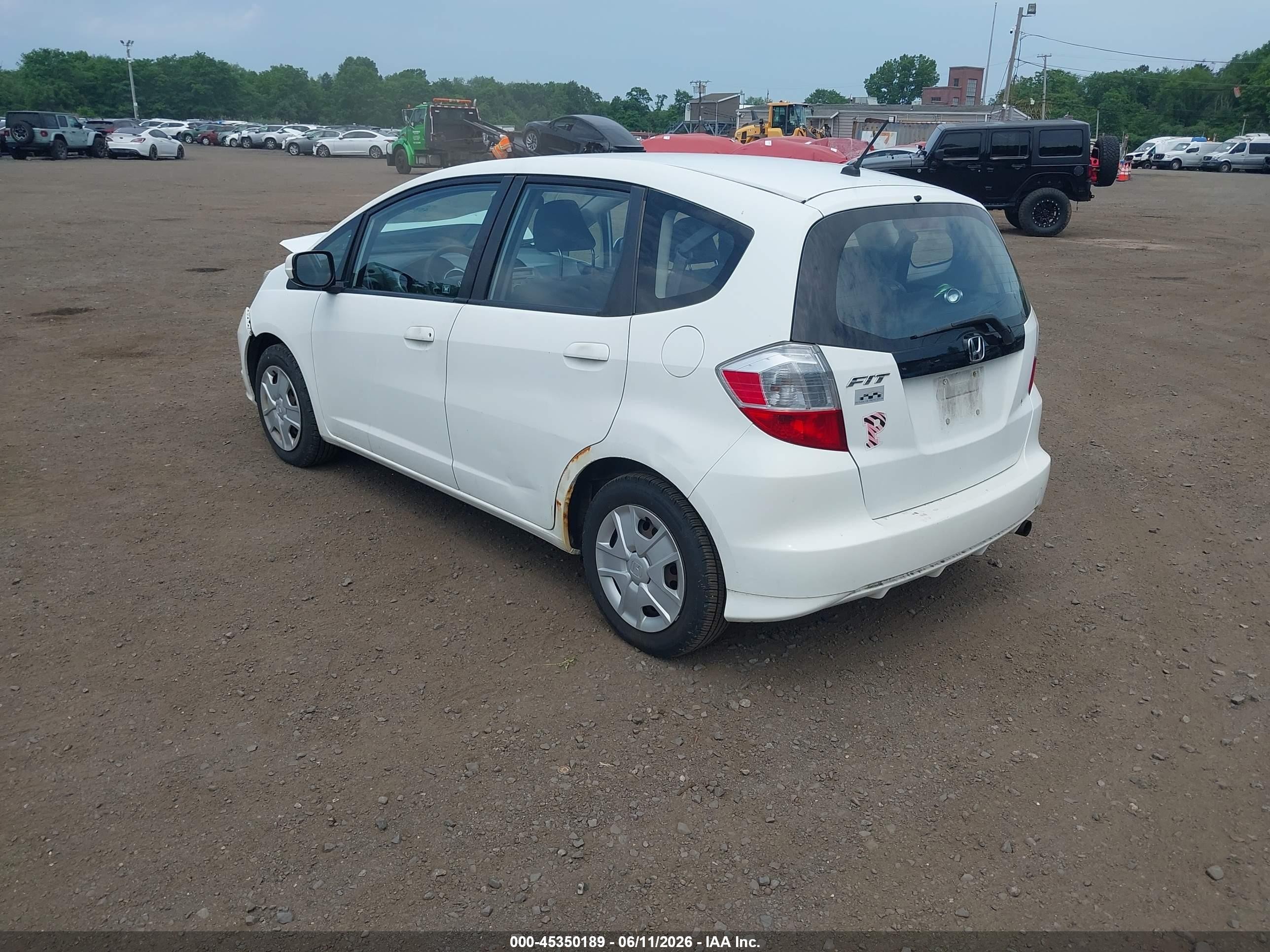 2012 Honda Fit   White vin: JHMGE8H34CC020377
