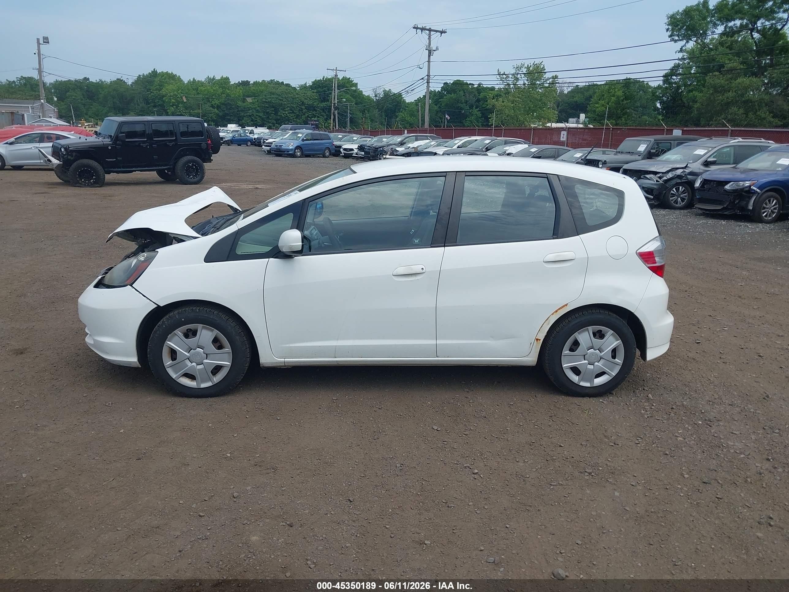 2012 Honda Fit   White vin: JHMGE8H34CC020377