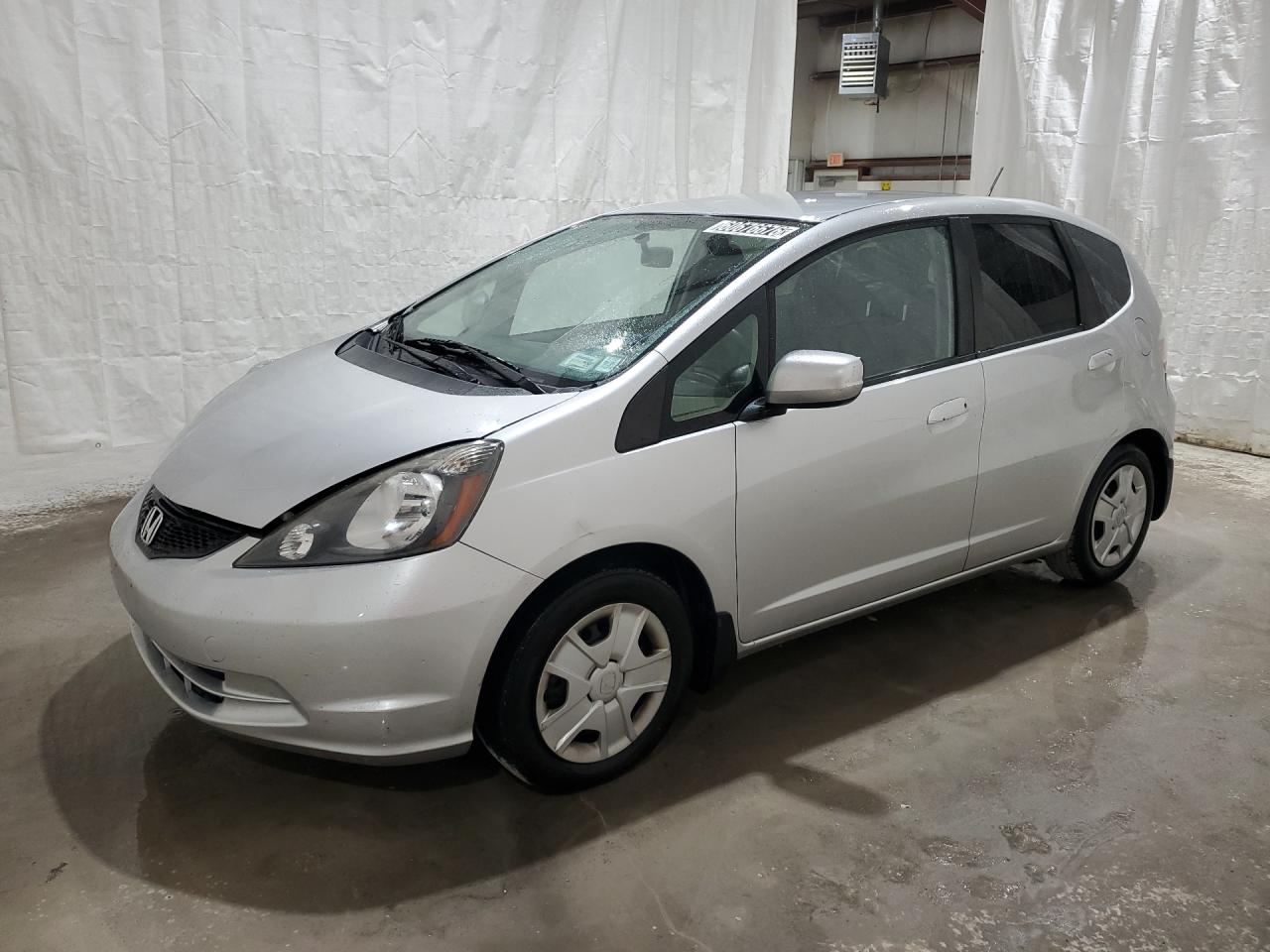 2013 Honda Fit Silver vin: JHMGE8H34DC007906 Damage: Left Front Fender, Multiple Scratches Heavy, 3