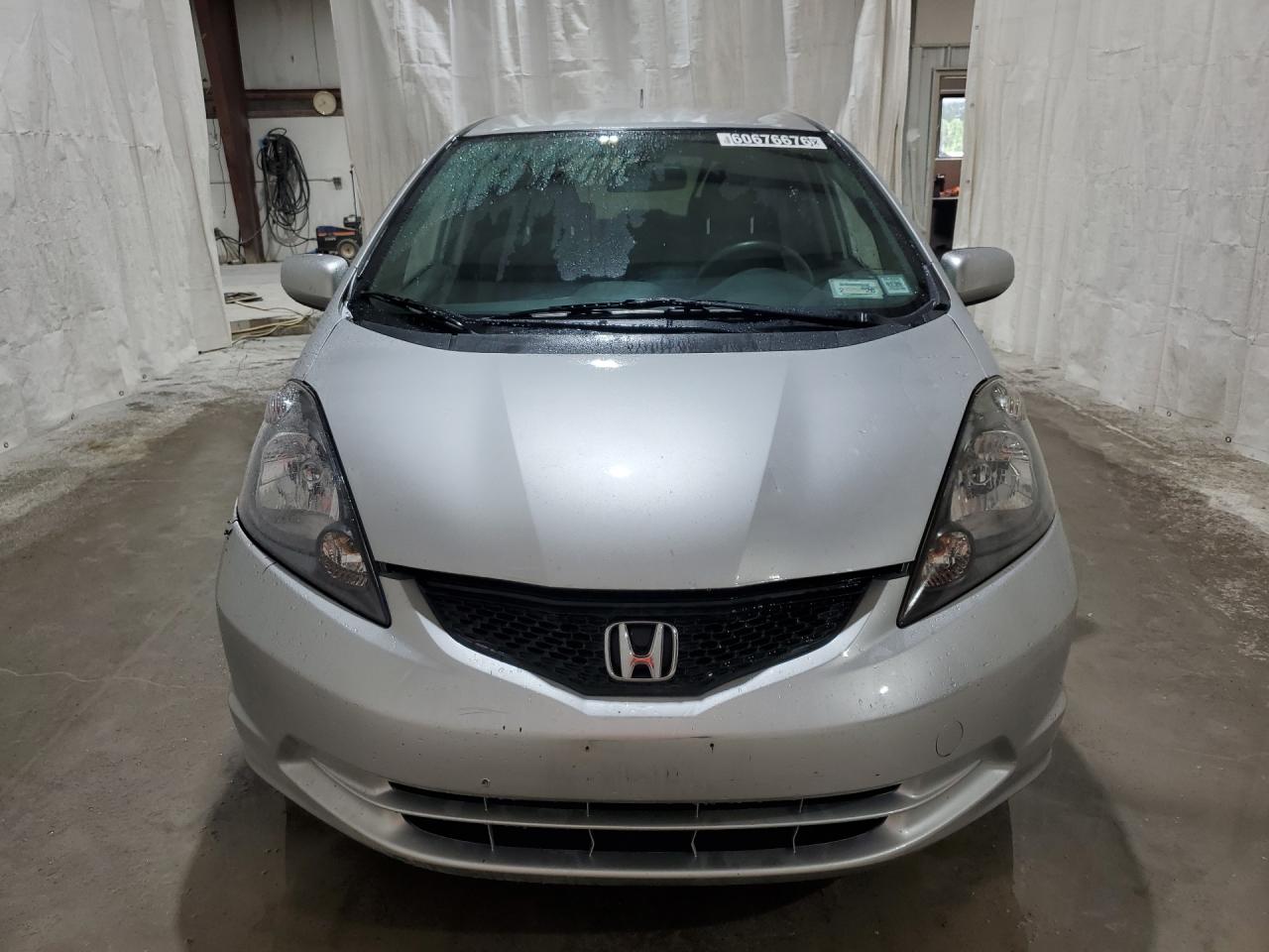 2013 Honda Fit Silver vin: JHMGE8H34DC007906 Damage: Front Bumper, Broken, Replacement Required