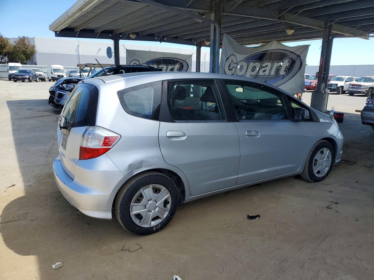 2012 Honda Fit Silver vin: JHMGE8H35CC033770