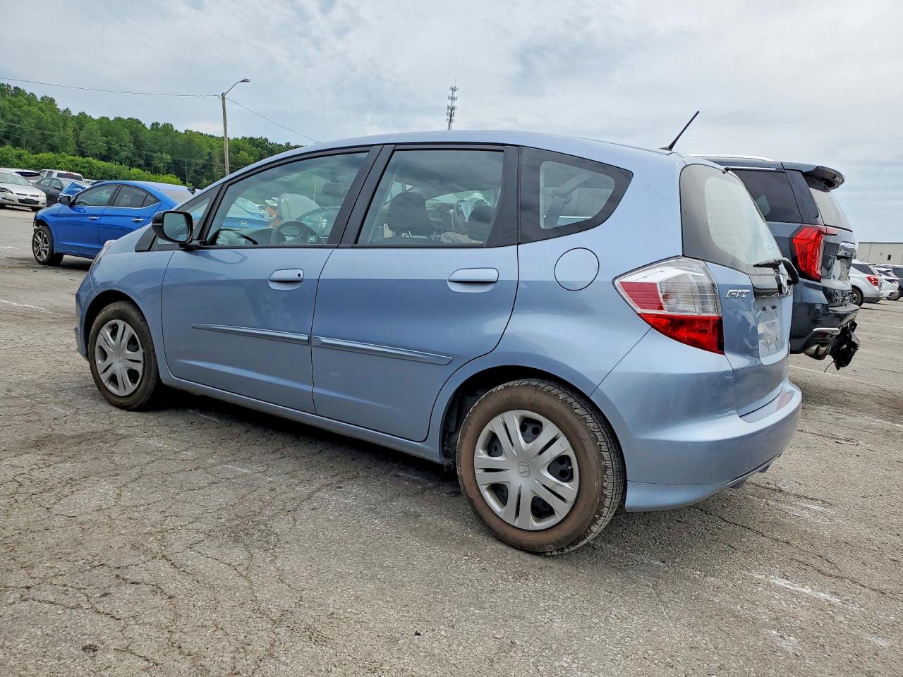 2011 Honda Fit Turquoise vin: JHMGE8H36BC018161