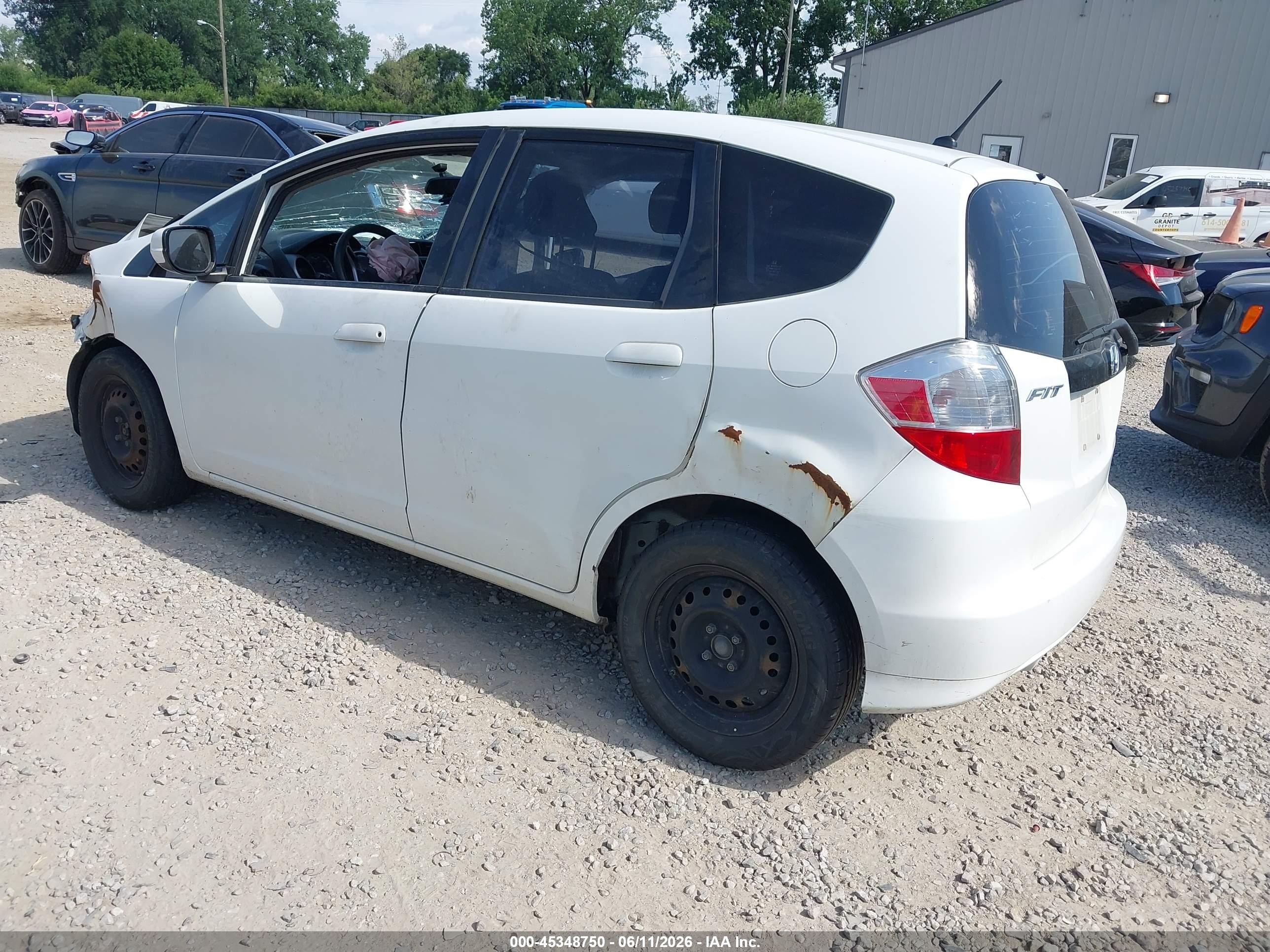2012 Honda Fit   White vin: JHMGE8H36CC037066