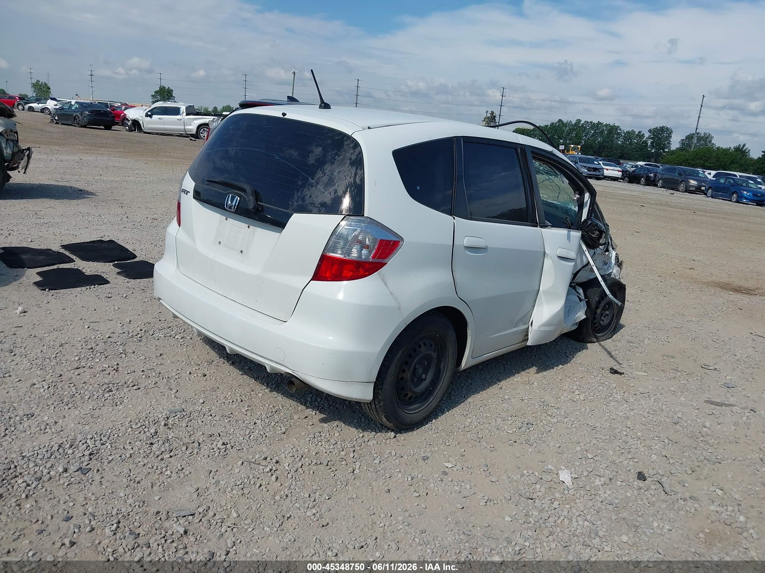 2012 Honda Fit   White vin: JHMGE8H36CC037066