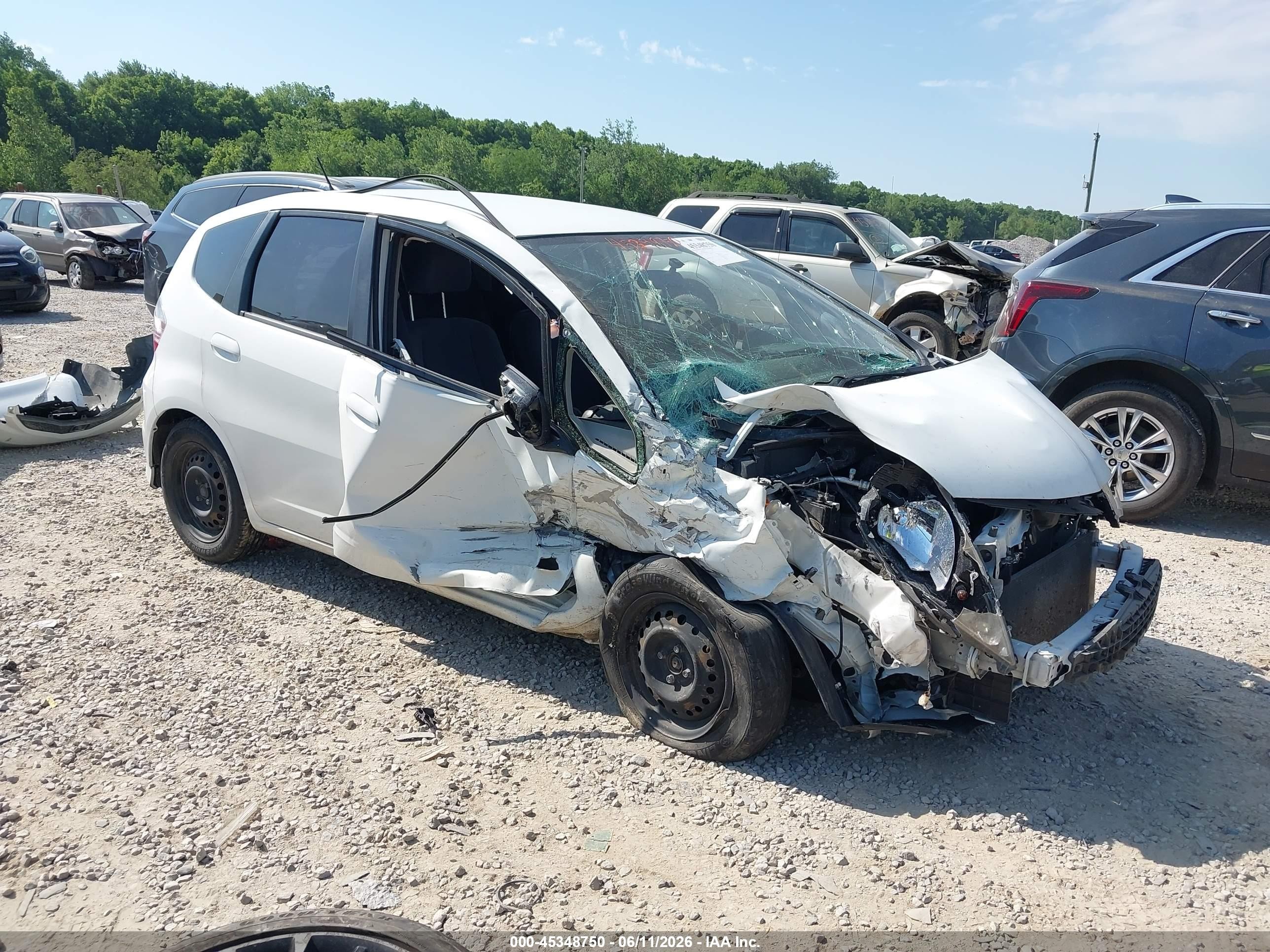 2012 Honda Fit   White vin: JHMGE8H36CC037066