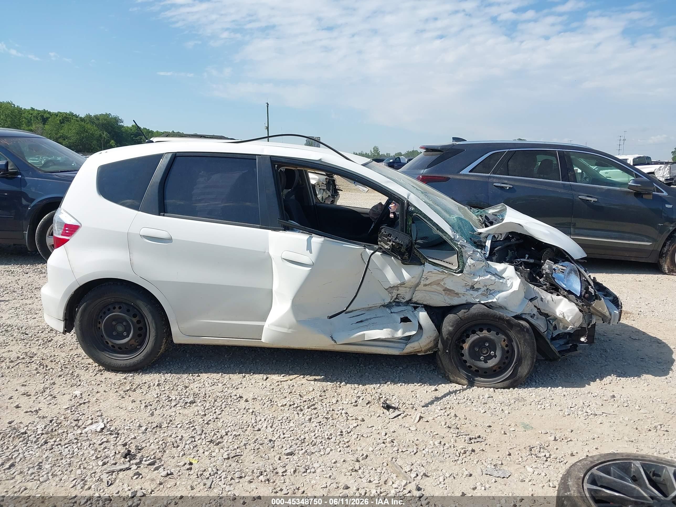 2012 Honda Fit   White vin: JHMGE8H36CC037066