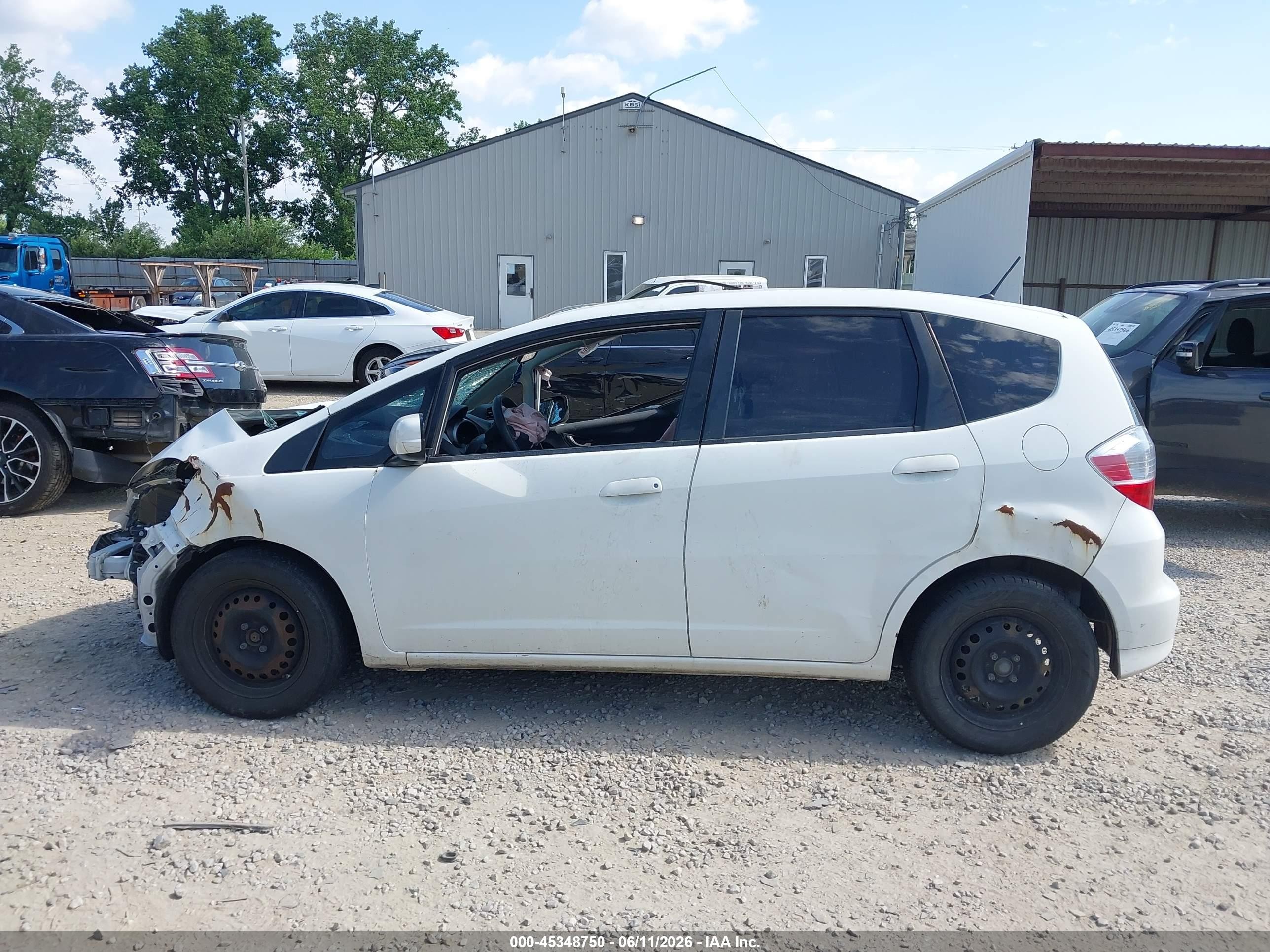 2012 Honda Fit   White vin: JHMGE8H36CC037066