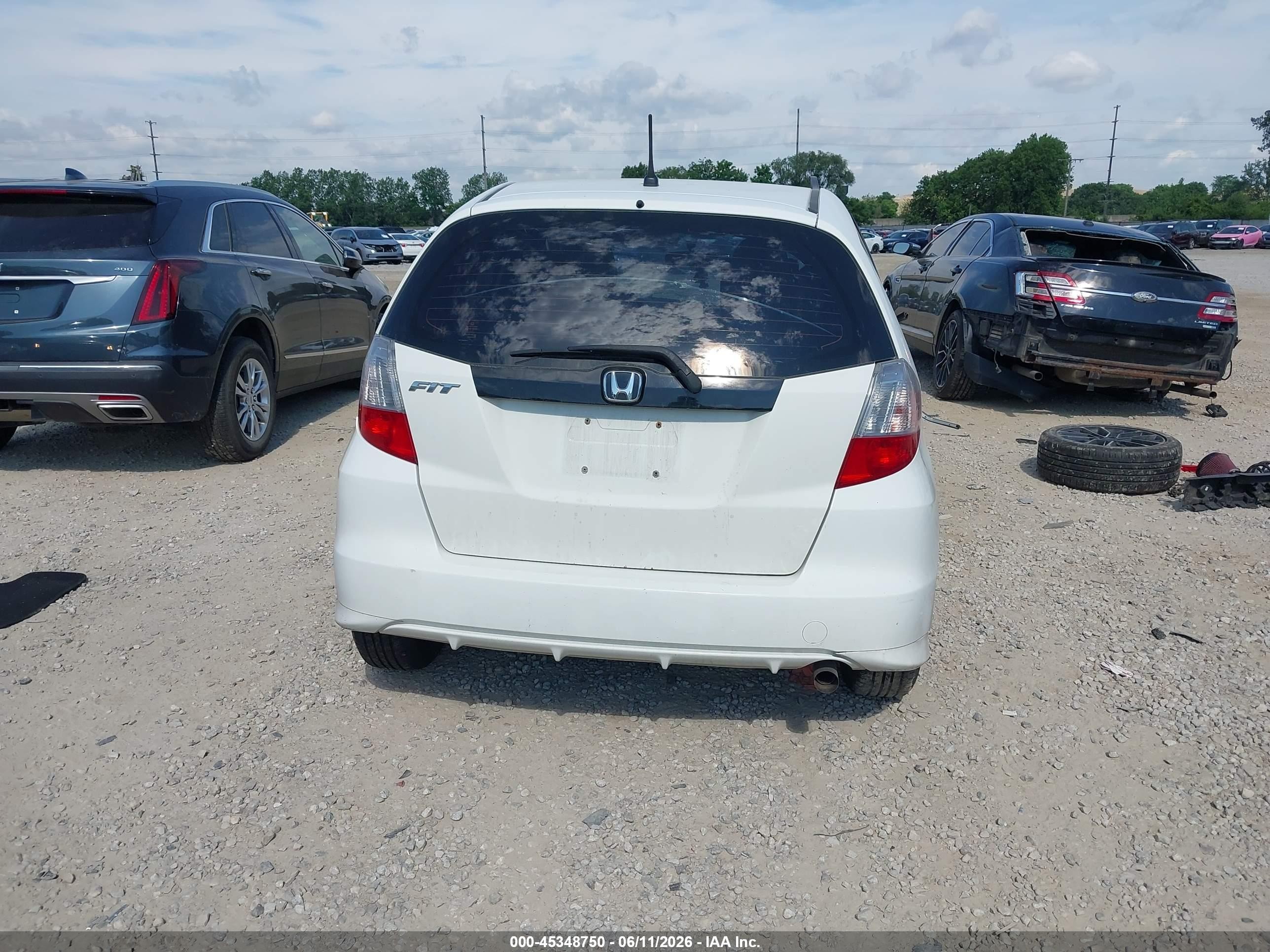 2012 Honda Fit   White vin: JHMGE8H36CC037066