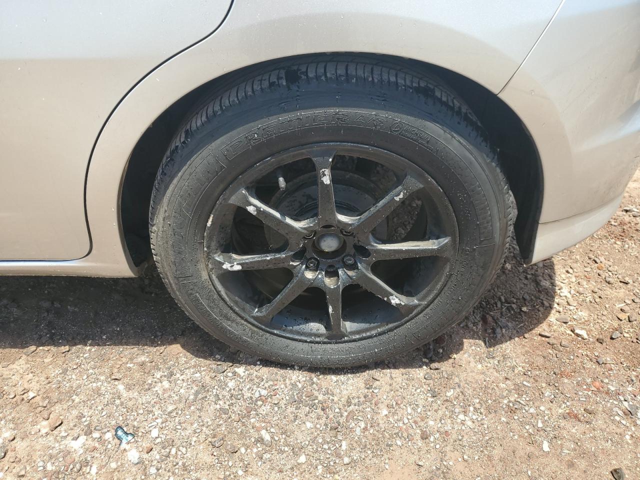 2012 Honda Fit Silver vin: JHMGE8H38CC017000 Damage: Left Rear Wheel, Mismatched, Replacement Required