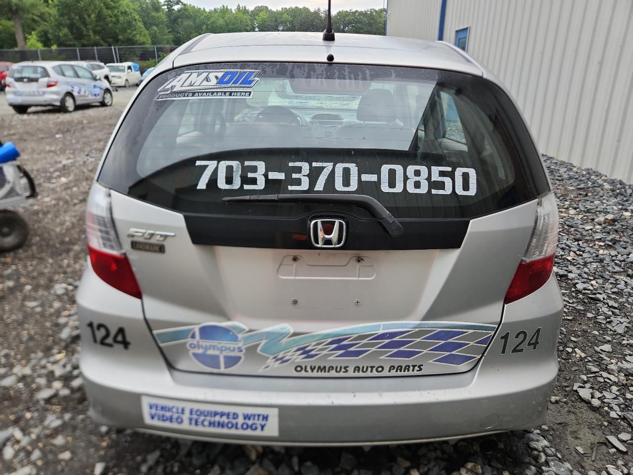 2012 Honda Fit Silver vin: JHMGE8H38CS002129 Damage: Lift Gate, Dent(S) W/ Paint Dmg, 1/2 To 1 Inch