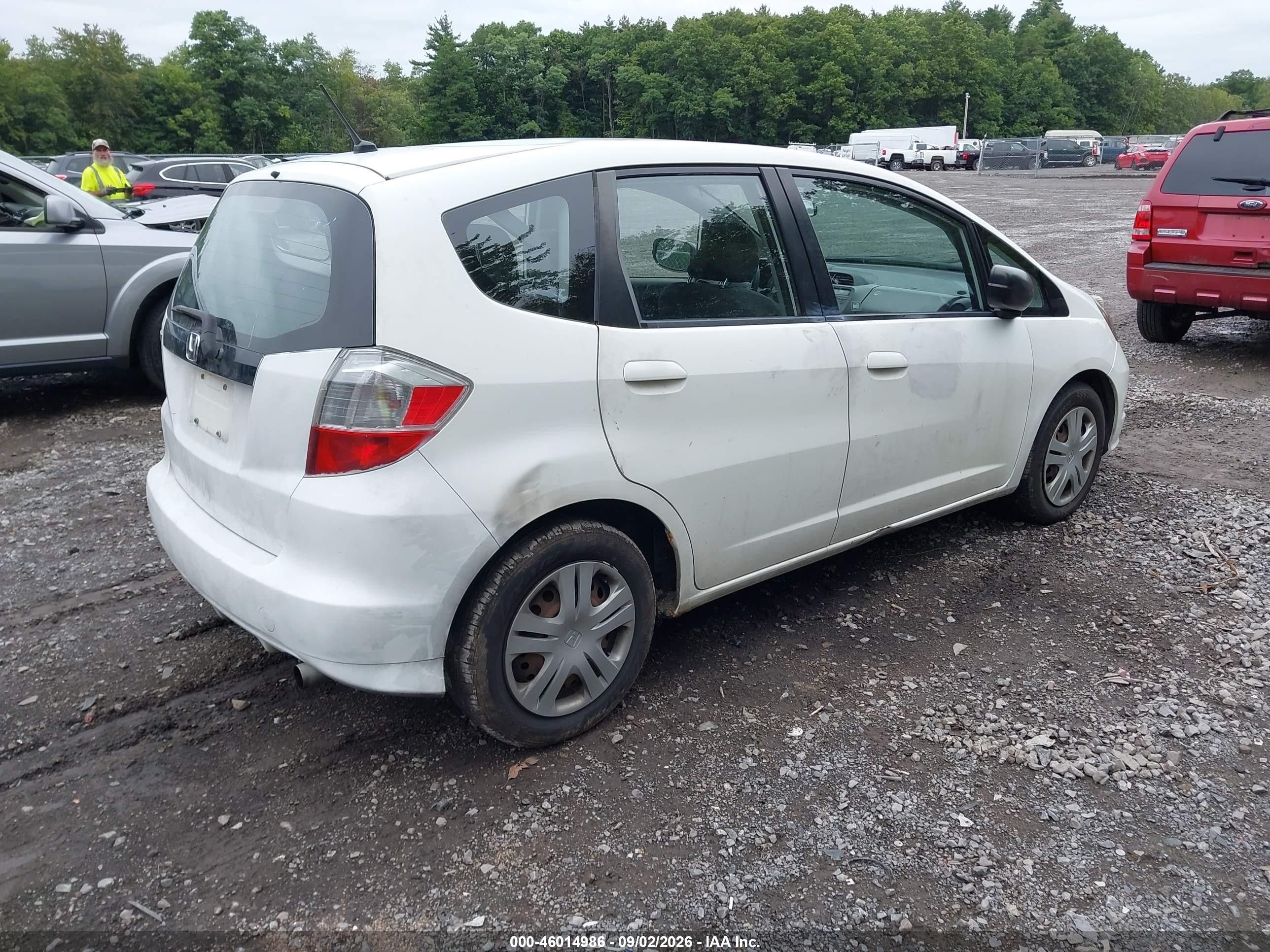 2011 Honda Fit   White vin: JHMGE8H3XBC022827