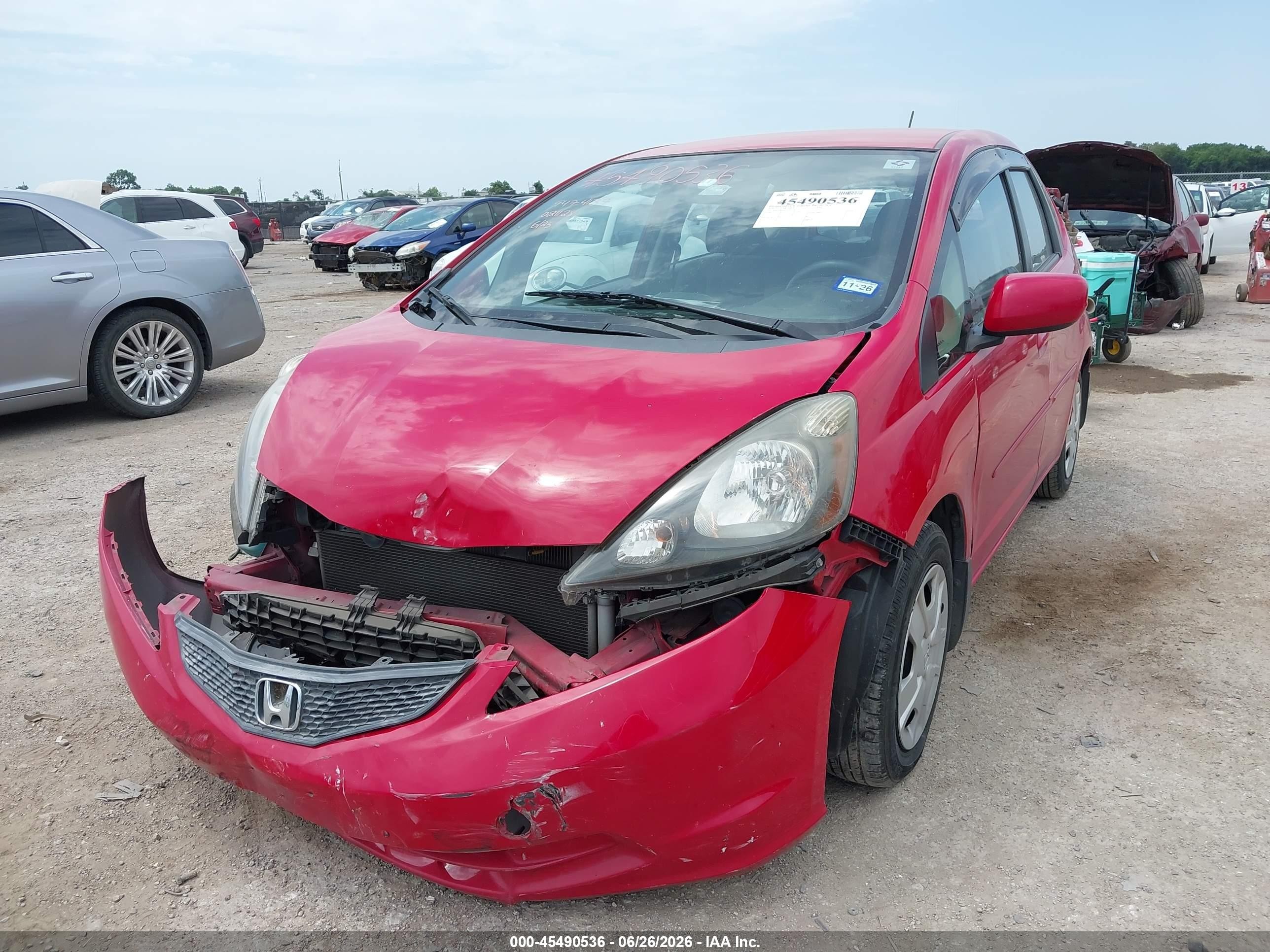 2012 Honda Fit   Red vin: JHMGE8H3XCC021128