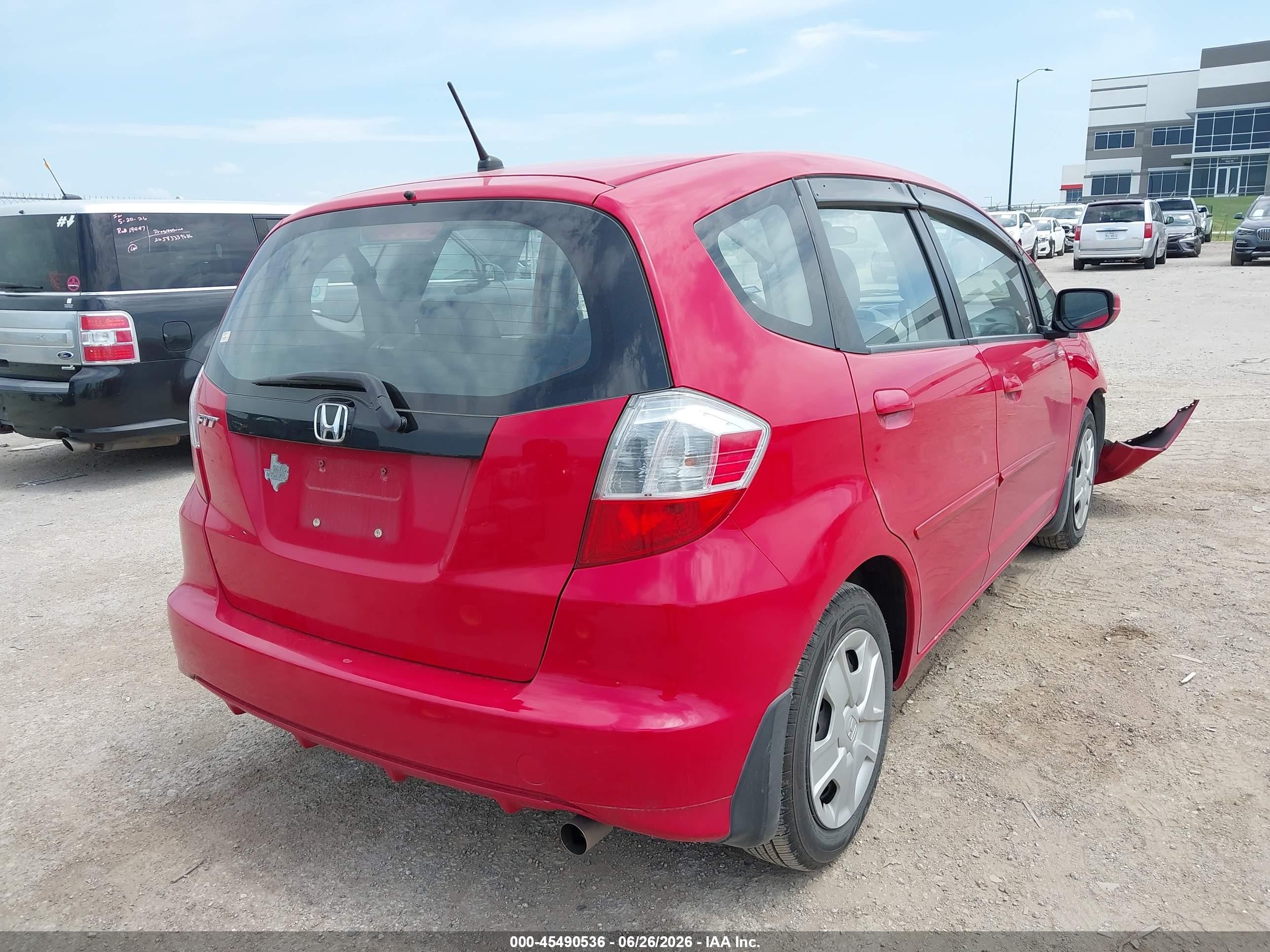 2012 Honda Fit   Red vin: JHMGE8H3XCC021128