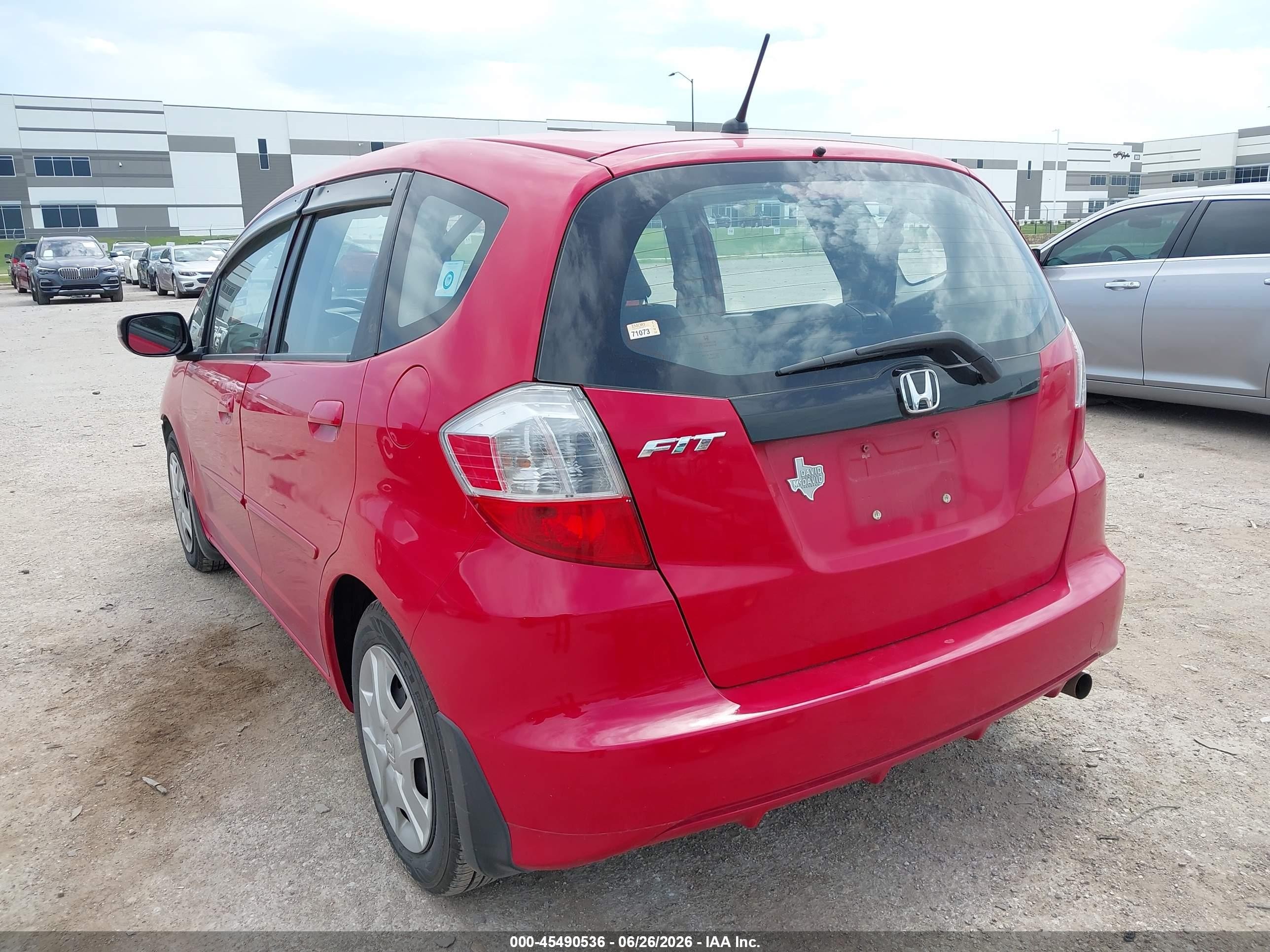 2012 Honda Fit   Red vin: JHMGE8H3XCC021128