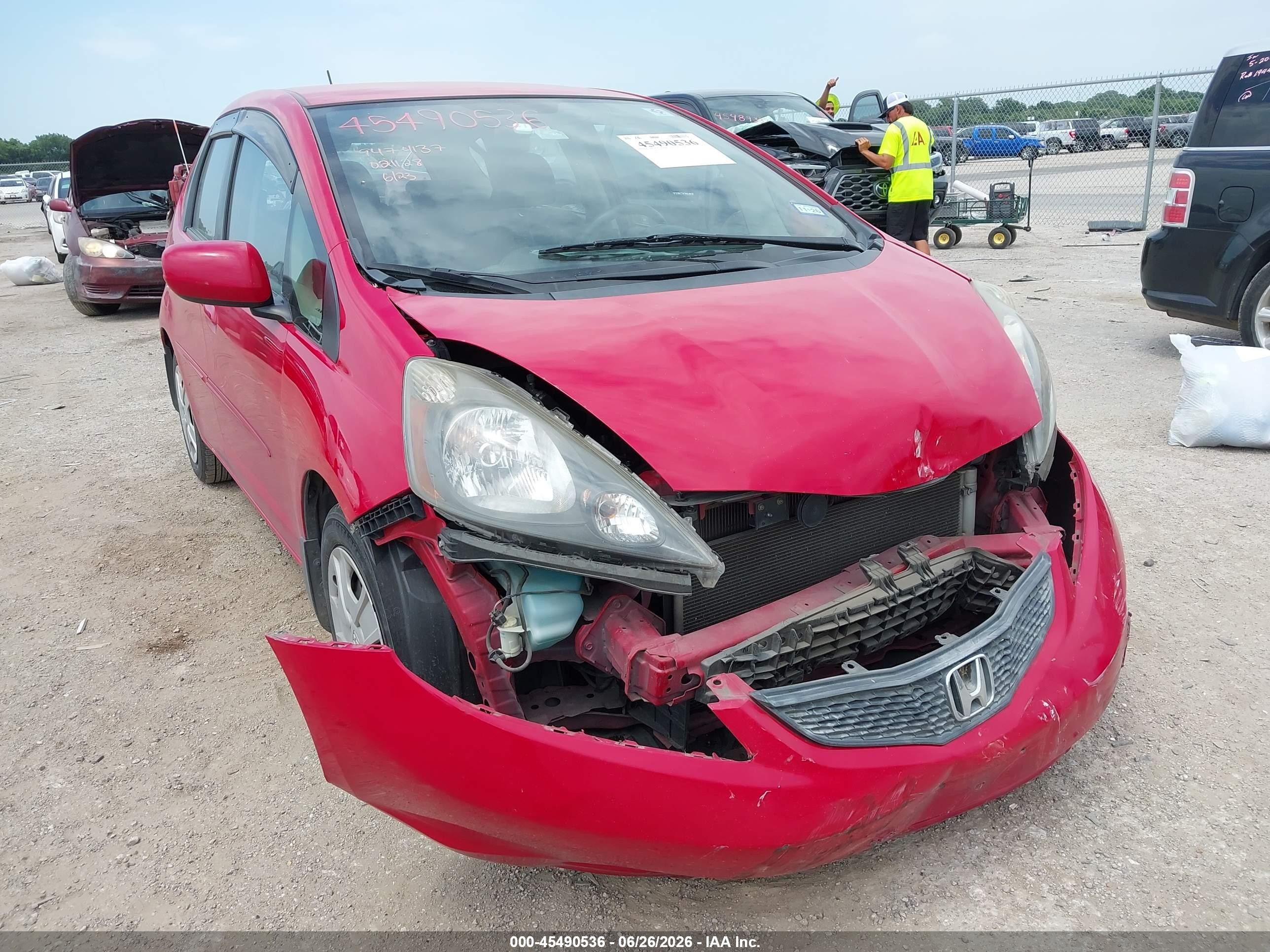 2012 Honda Fit   Red vin: JHMGE8H3XCC021128
