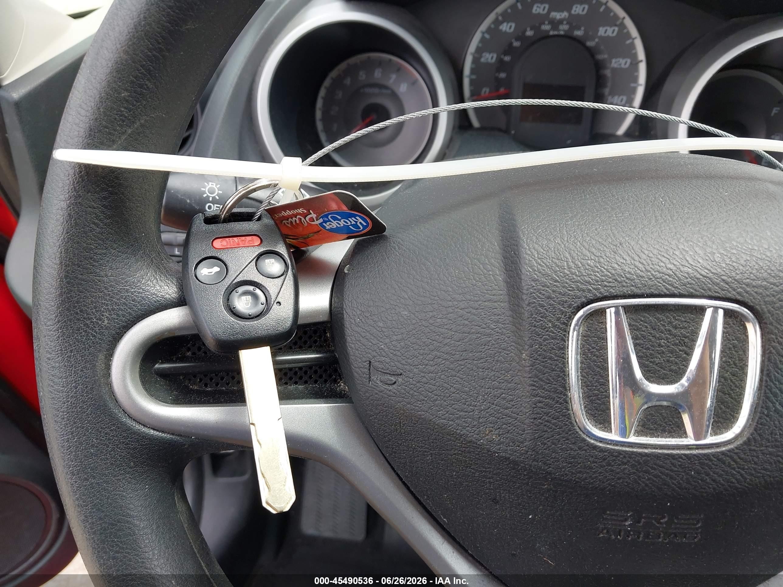 2012 Honda Fit   Red vin: JHMGE8H3XCC021128
