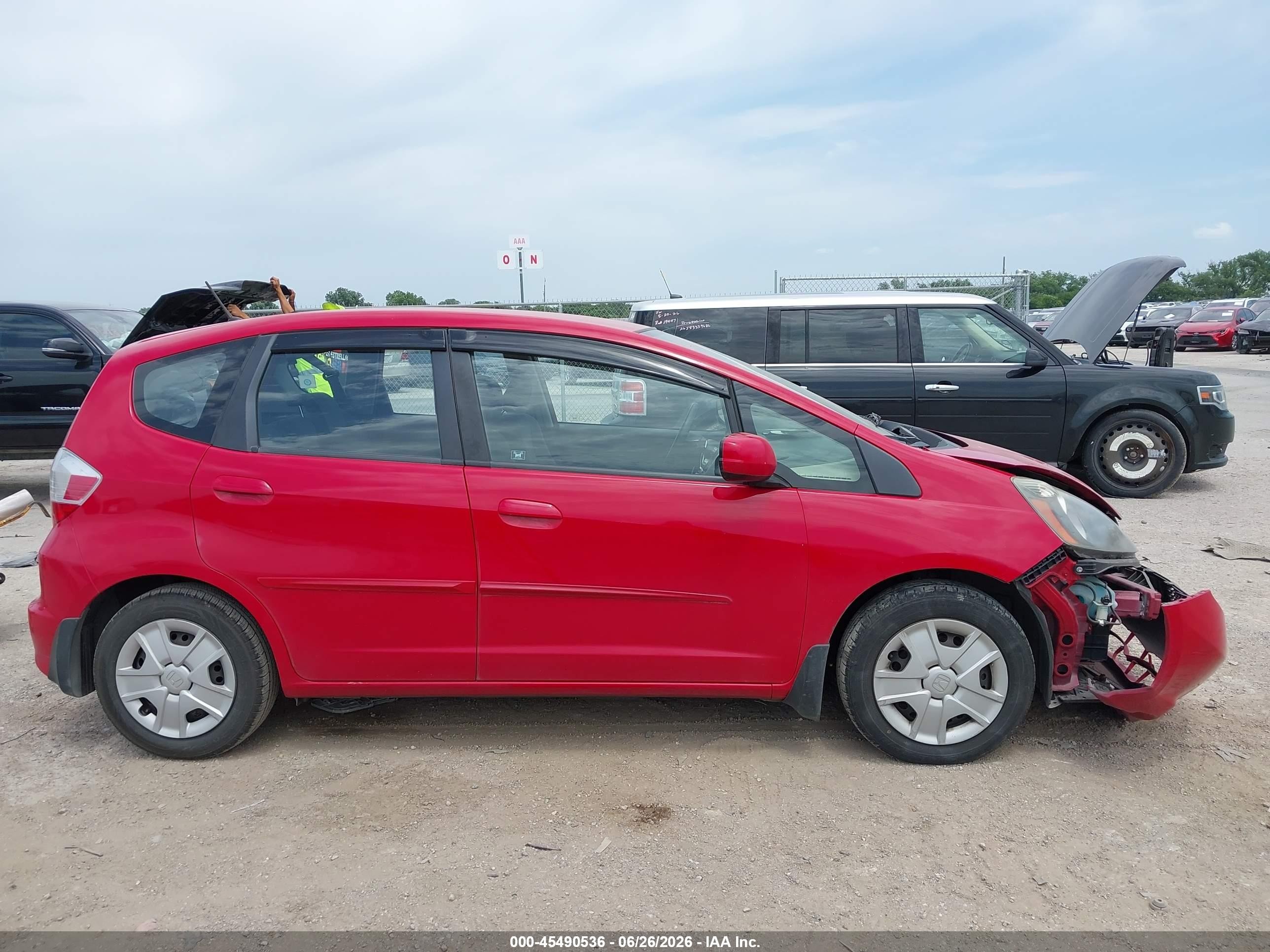 2012 Honda Fit   Red vin: JHMGE8H3XCC021128