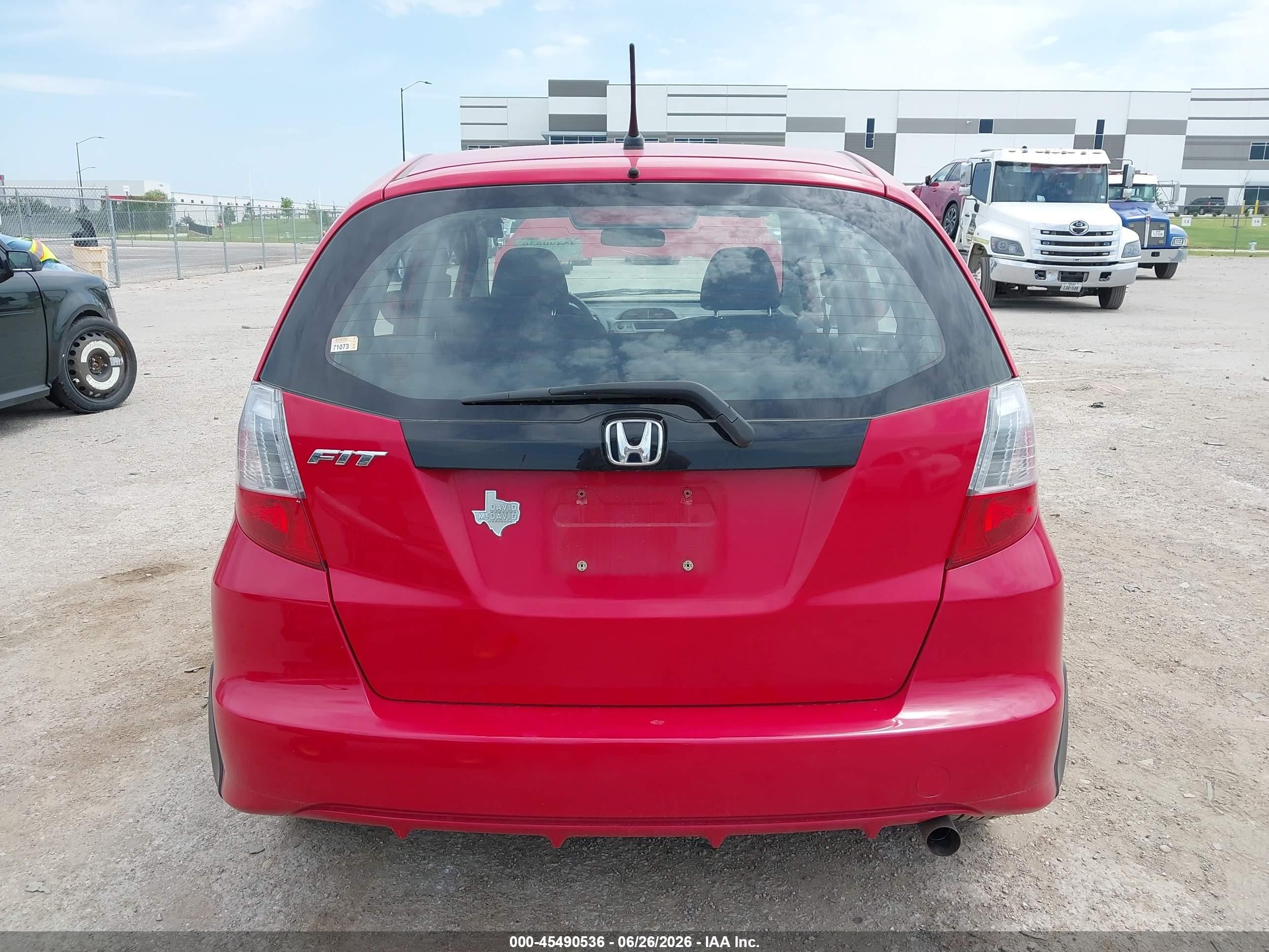 2012 Honda Fit   Red vin: JHMGE8H3XCC021128