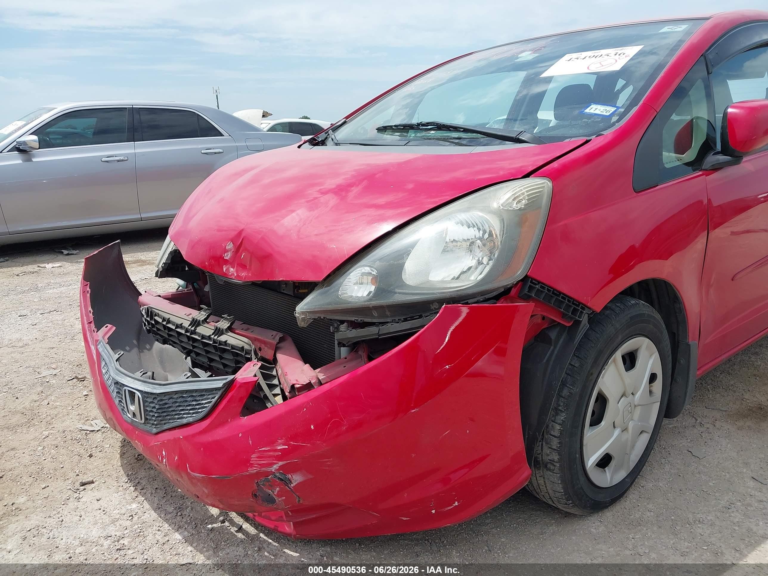 2012 Honda Fit   Red vin: JHMGE8H3XCC021128