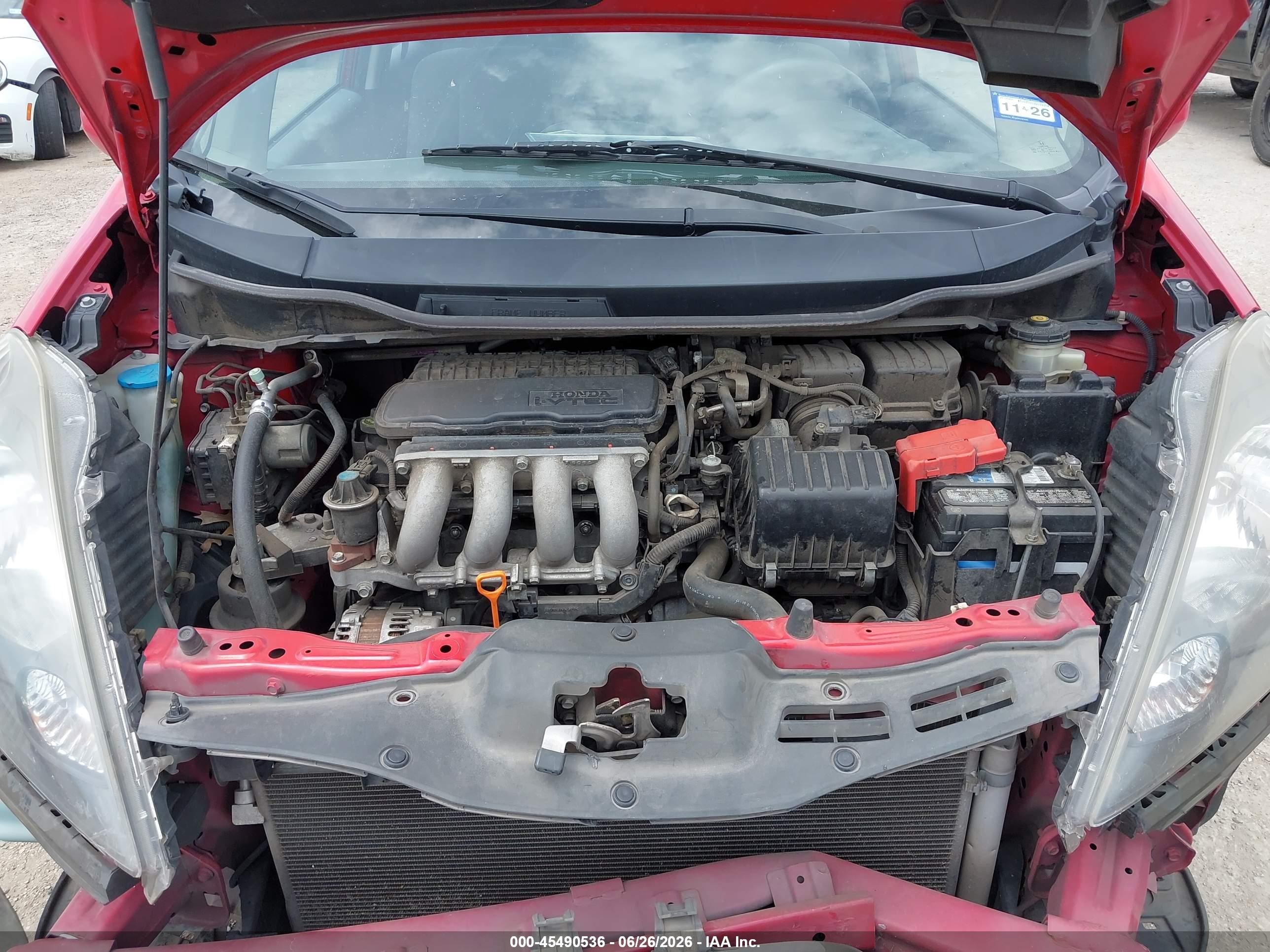 2012 Honda Fit   Red vin: JHMGE8H3XCC021128