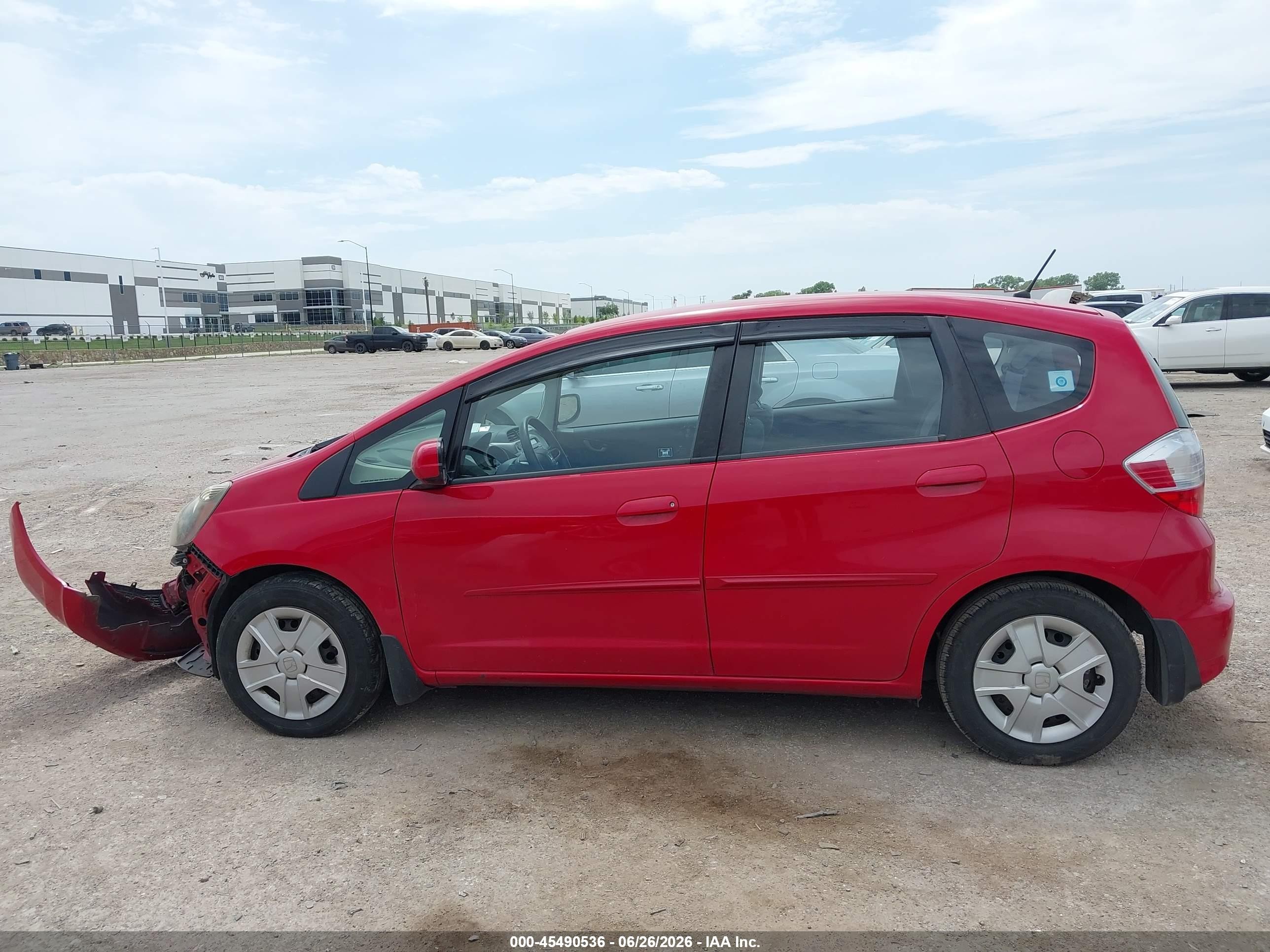 2012 Honda Fit   Red vin: JHMGE8H3XCC021128
