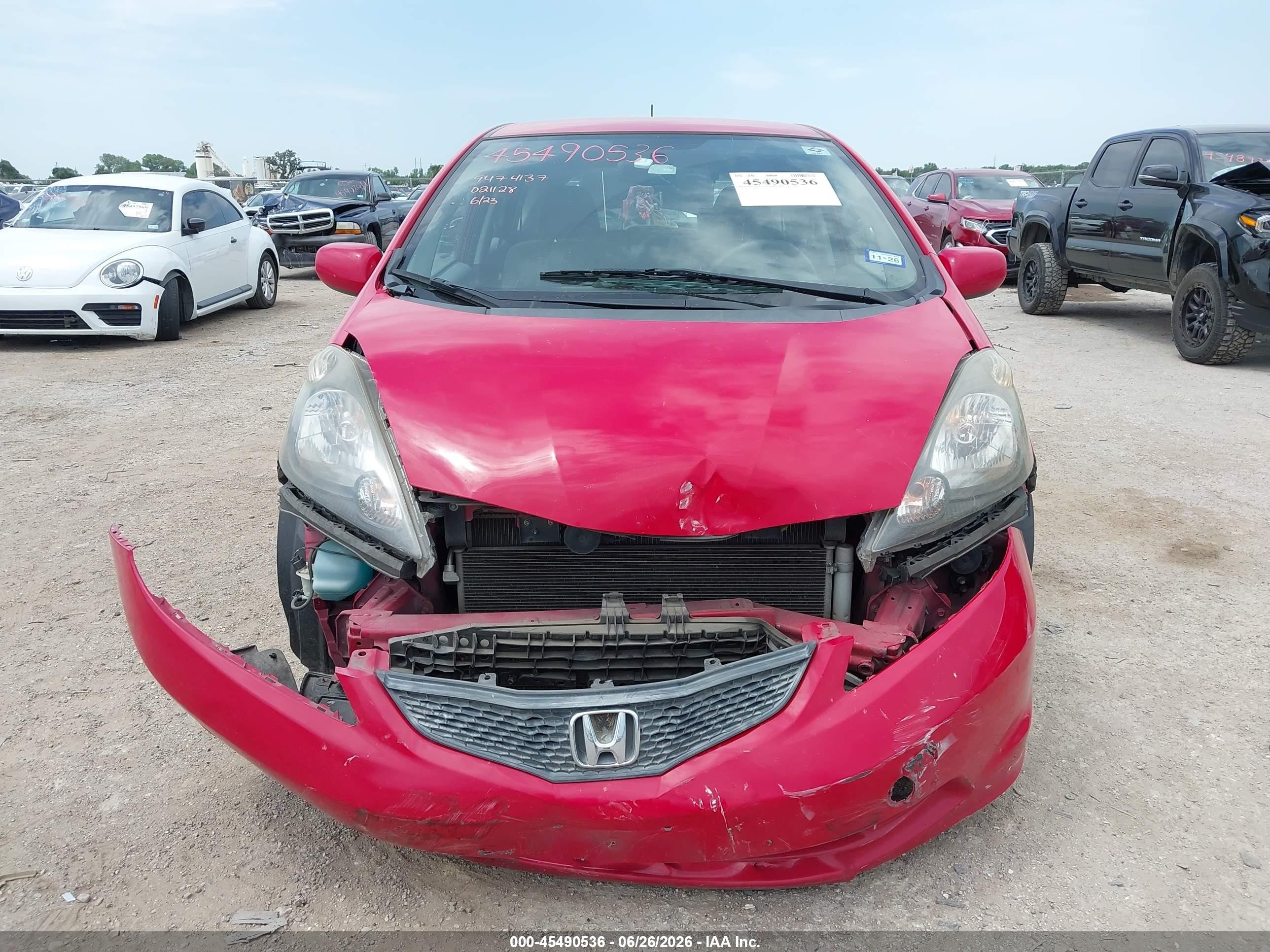 2012 Honda Fit   Red vin: JHMGE8H3XCC021128