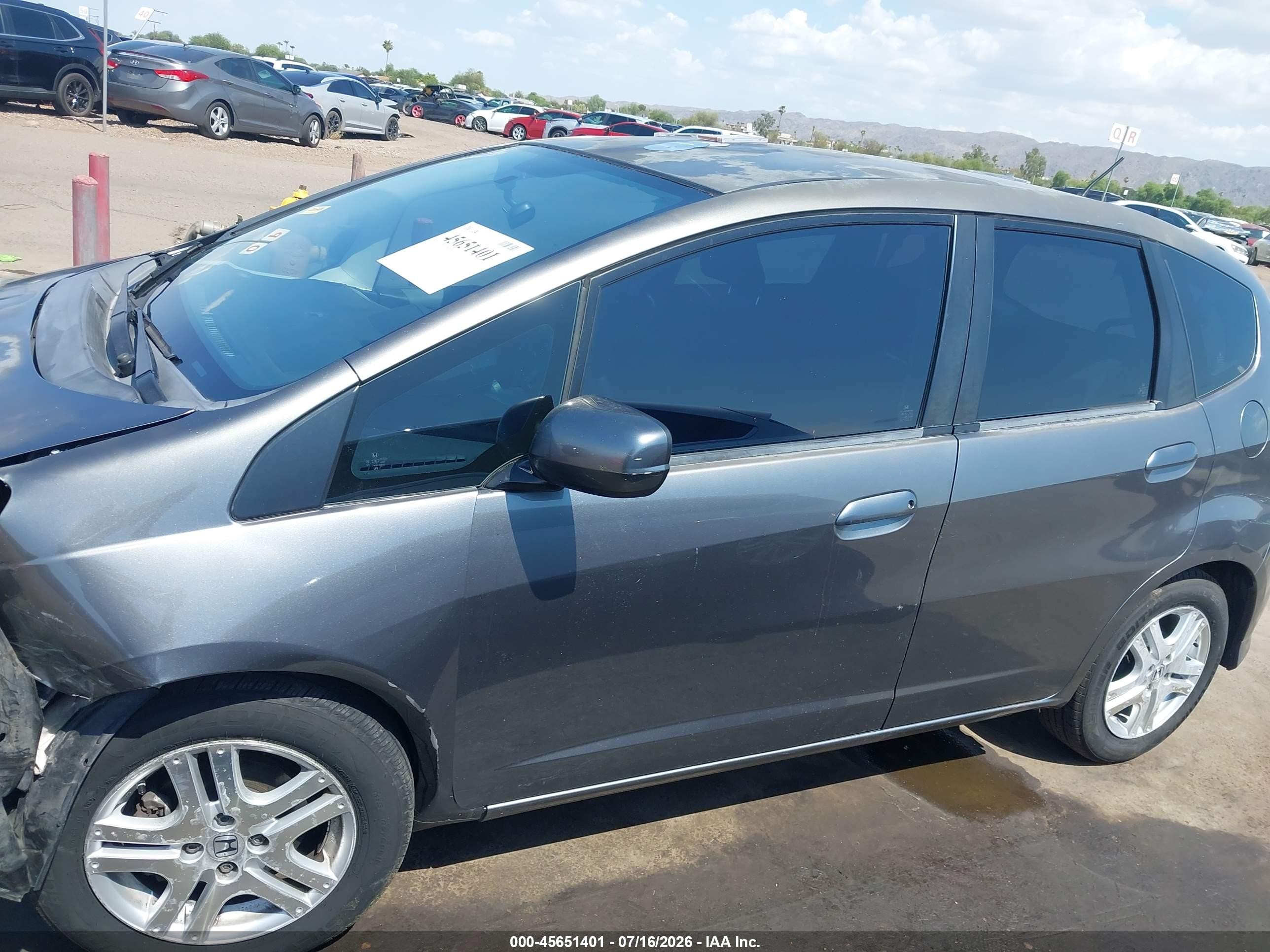 2012 Honda Fit   Black vin: JHMGE8H3XCC023865