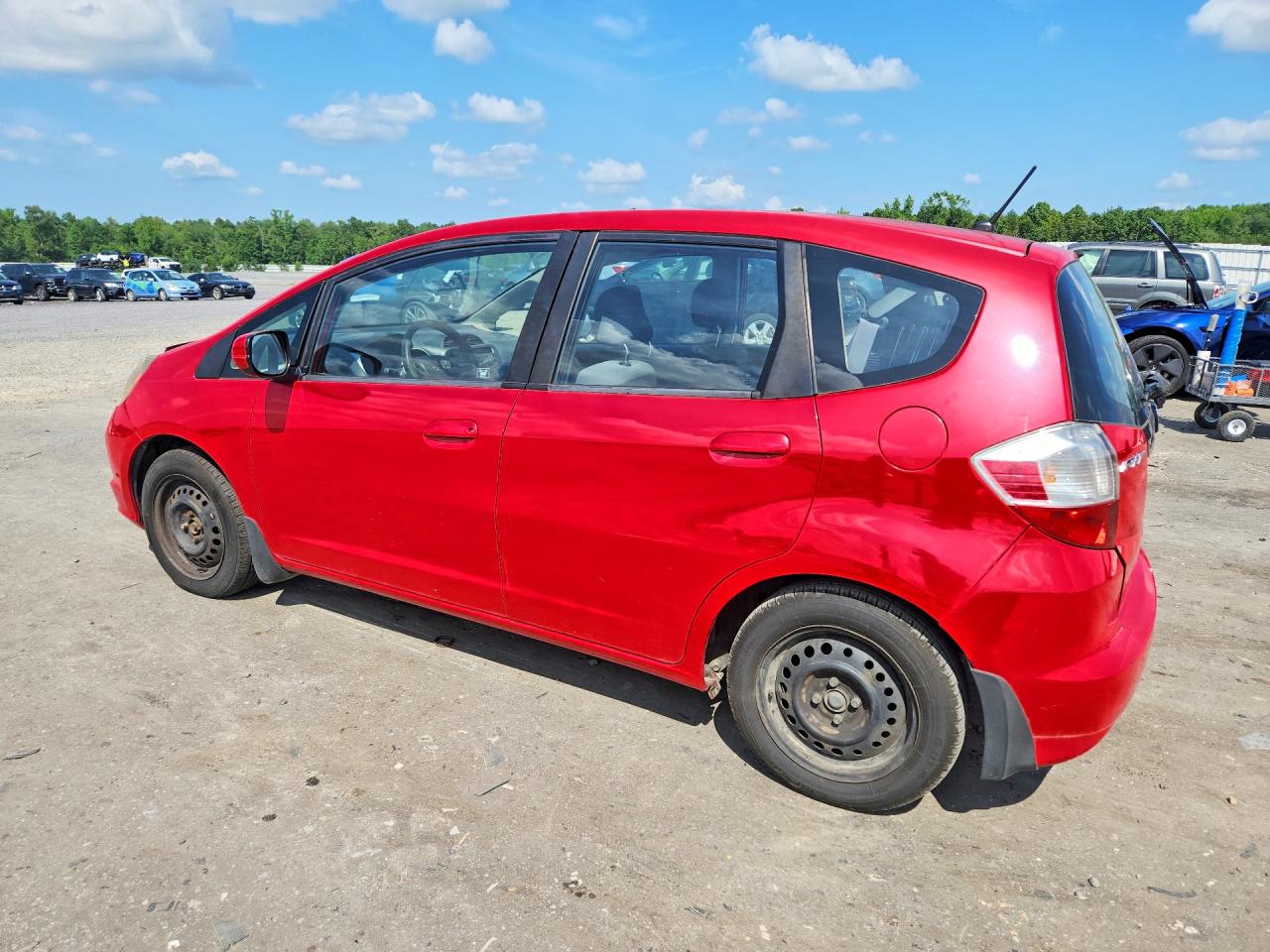 2012 Honda Fit Red vin: JHMGE8H3XCS005081