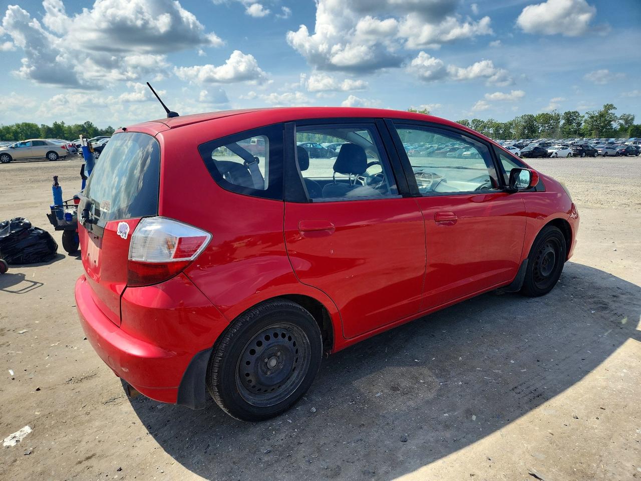 2012 Honda Fit Red vin: JHMGE8H3XCS005081