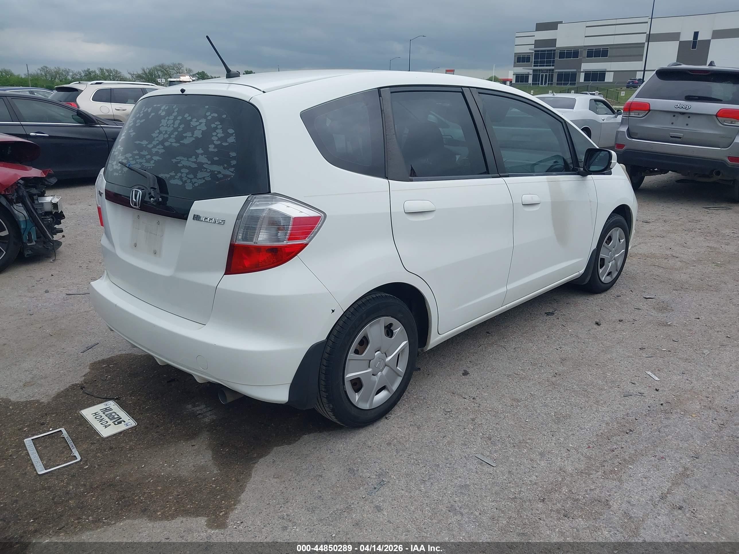 2013 Honda Fit   White vin: JHMGE8H3XDC080469