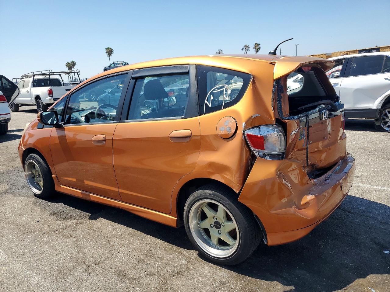 2010 Honda Fit Sport Orange vin: JHMGE8H45AC009460