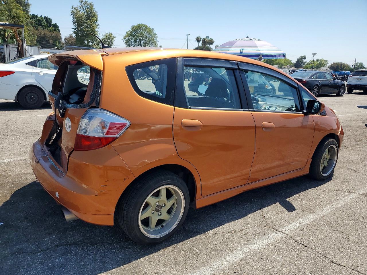 2010 Honda Fit Sport Orange vin: JHMGE8H45AC009460