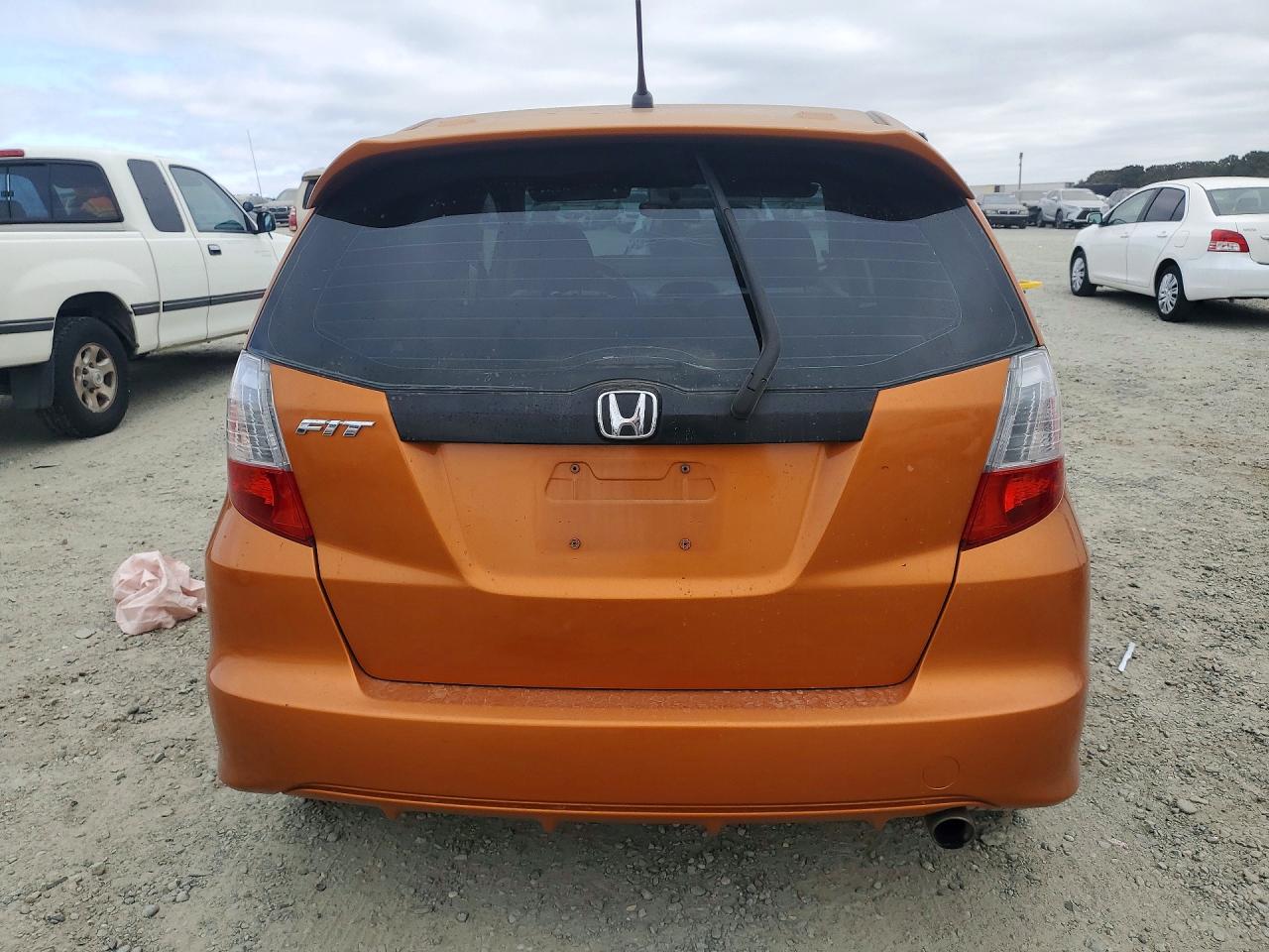 2010 Honda Fit Sport Оранжевый vin: JHMGE8H48AC013776