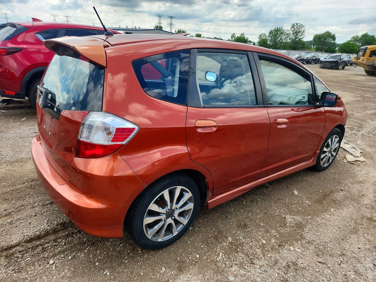2012 Honda Fit Sport Orange vin: JHMGE8H50CC027988