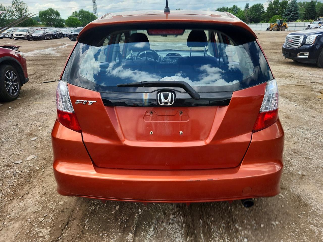 2012 Honda Fit Sport Orange vin: JHMGE8H50CC027988