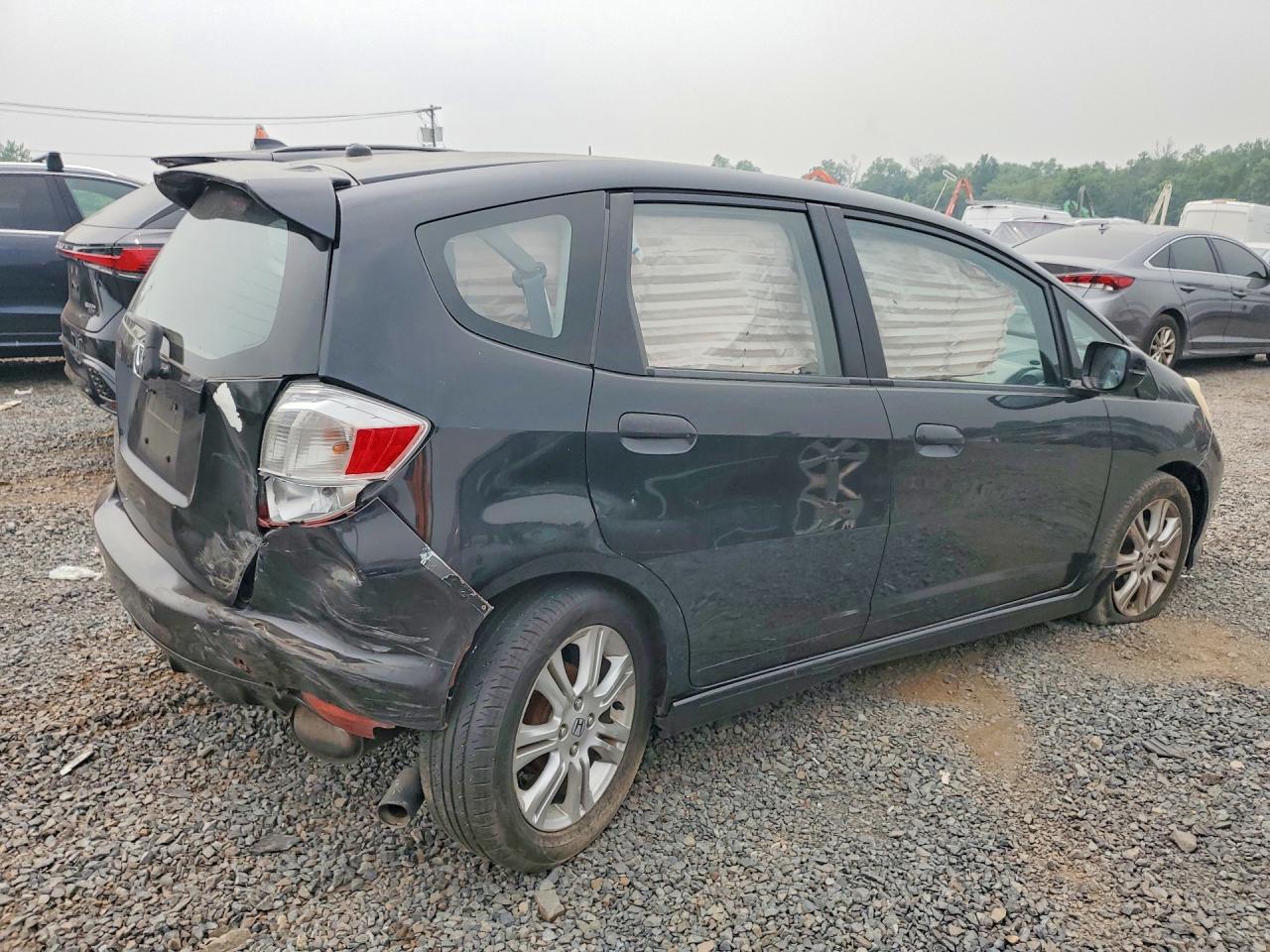 2011 Honda Fit Sport Черный vin: JHMGE8H54BS004976