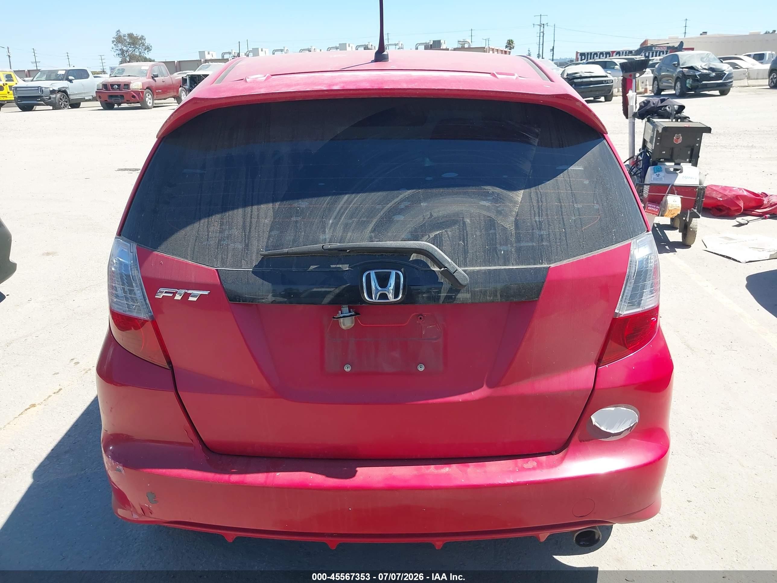 2012 Honda Fit Sport Red vin: JHMGE8H54CC008487