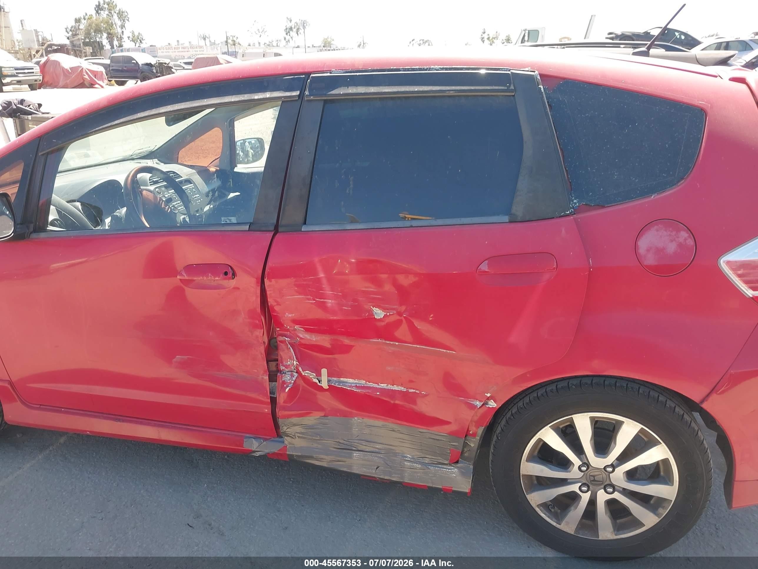 2012 Honda Fit Sport Red vin: JHMGE8H54CC008487