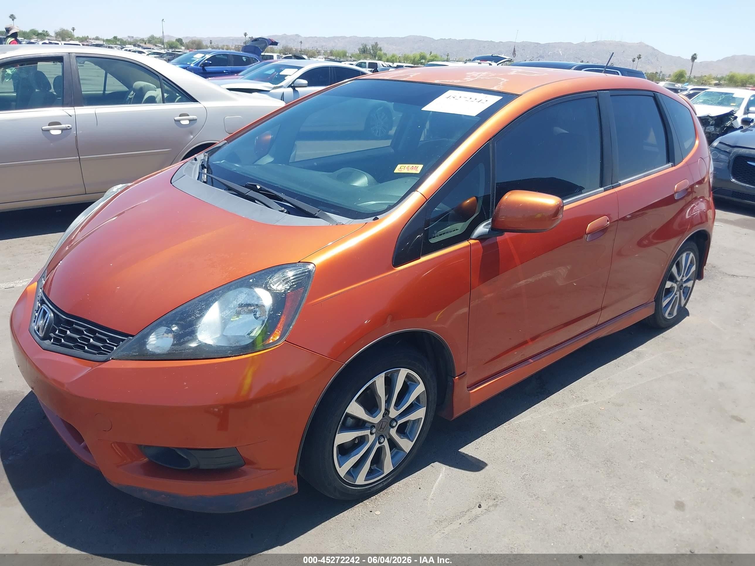 2012 Honda Fit Sport Orange vin: JHMGE8H56CC012587