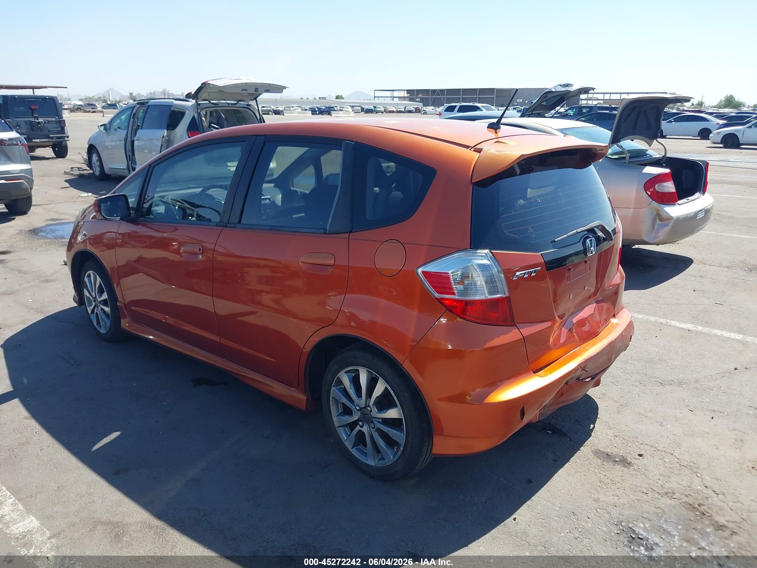 2012 Honda Fit Sport Orange vin: JHMGE8H56CC012587