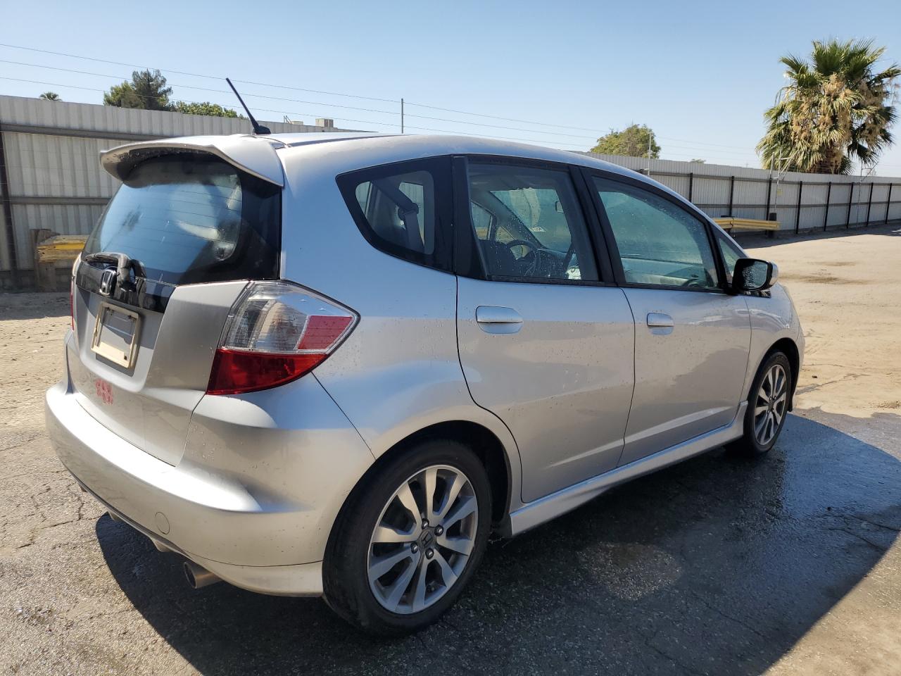 2013 Honda Fit Sport Silver vin: JHMGE8H56DC013109 Damage: Right Rear Door, Dent(S) W/No Paint Dmg, 1/2 To 1 Inch