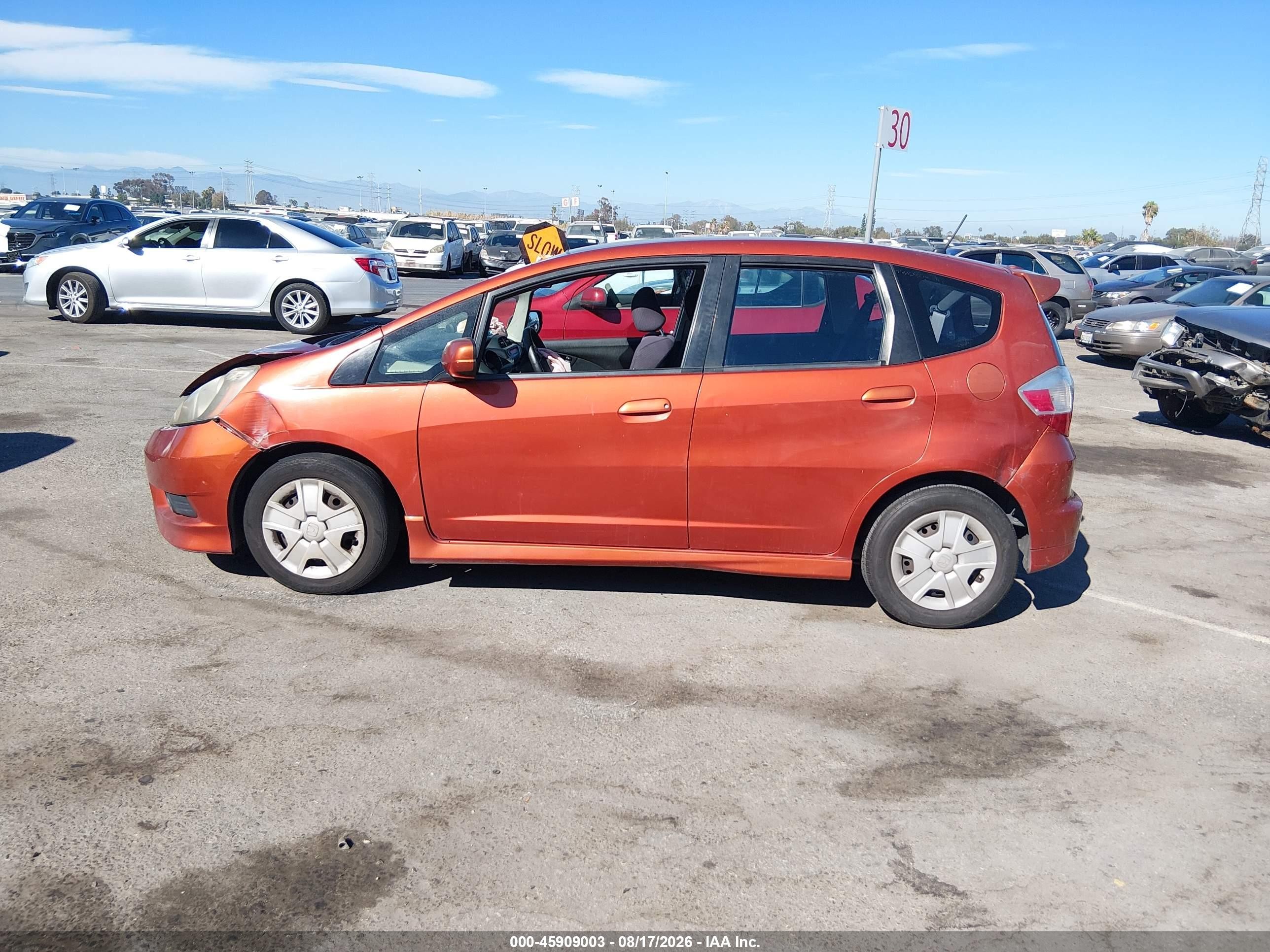 2012 Honda Fit Sport Orange vin: JHMGE8H58CC027947
