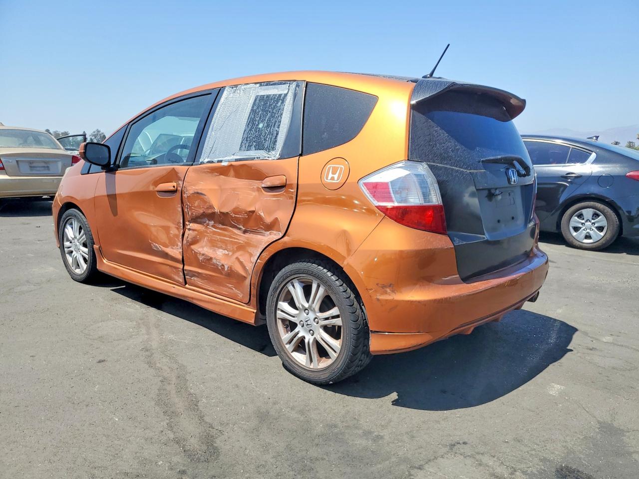 2011 Honda Fit Sport Orange vin: JHMGE8H67BS008755