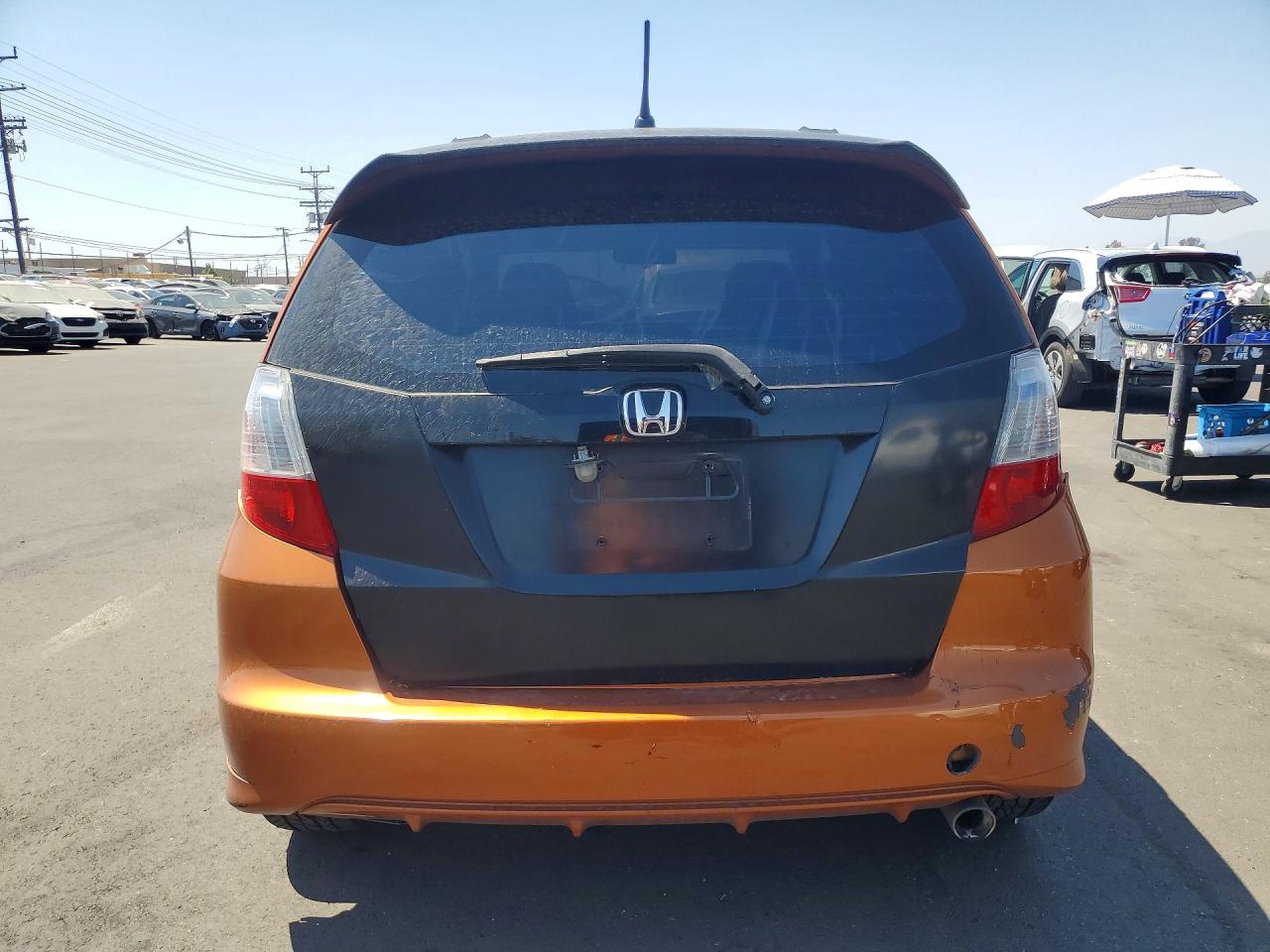 2011 Honda Fit Sport Orange vin: JHMGE8H67BS008755
