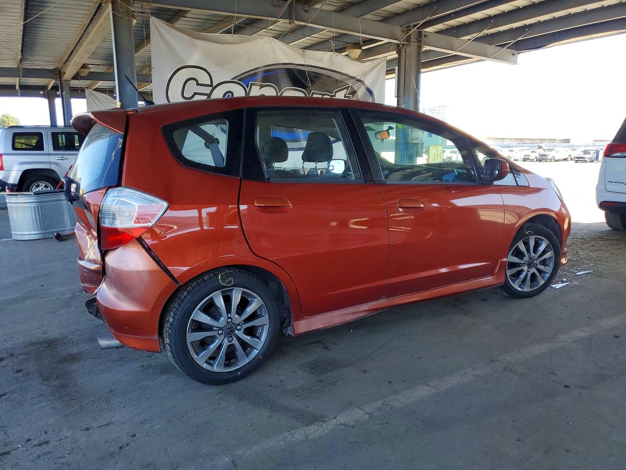 2012 Honda Fit Sport Orange vin: JHMGE8H68CC017508