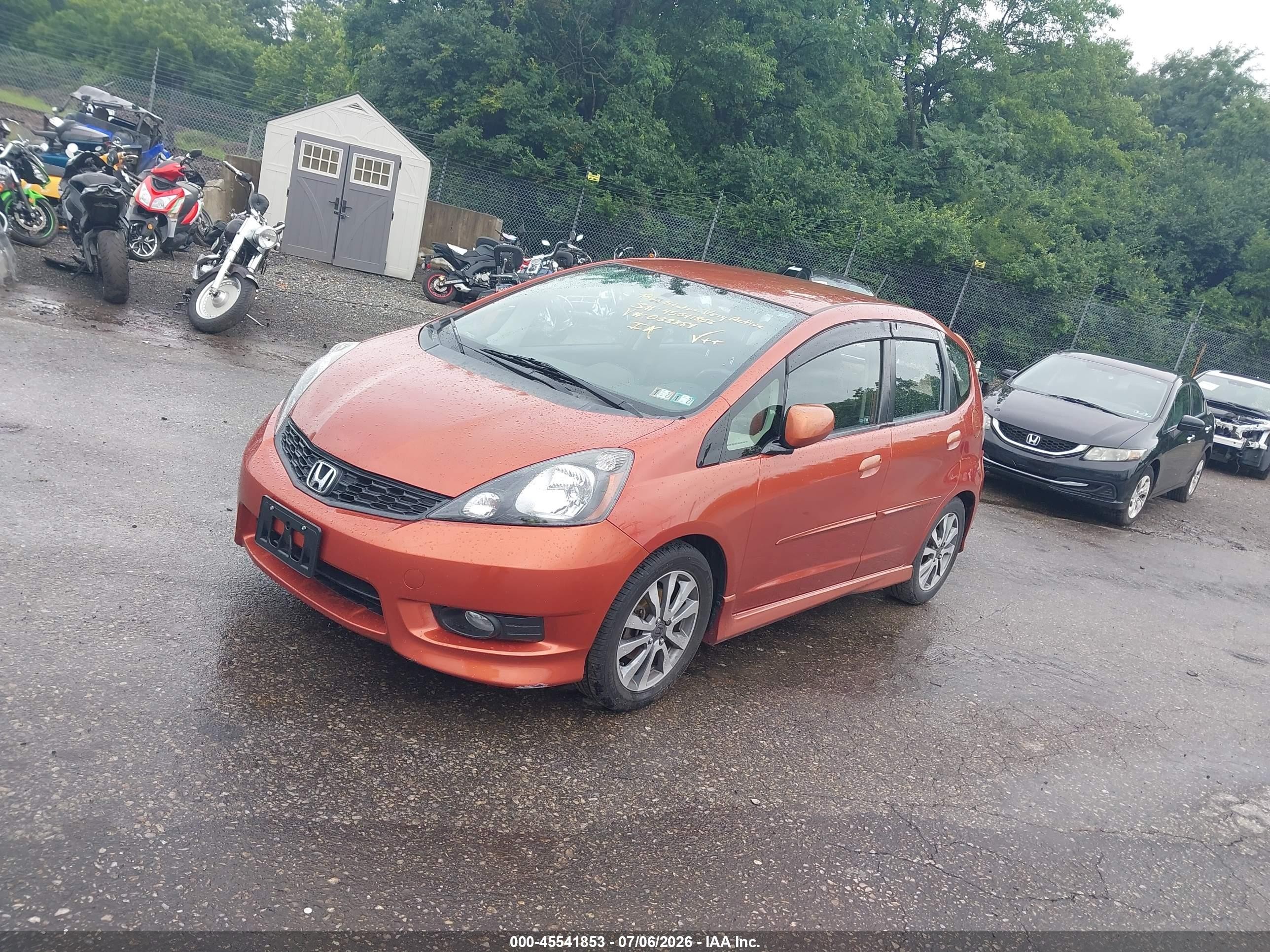 2012 Honda Fit Sport Orange vin: JHMGE8H68CC033384