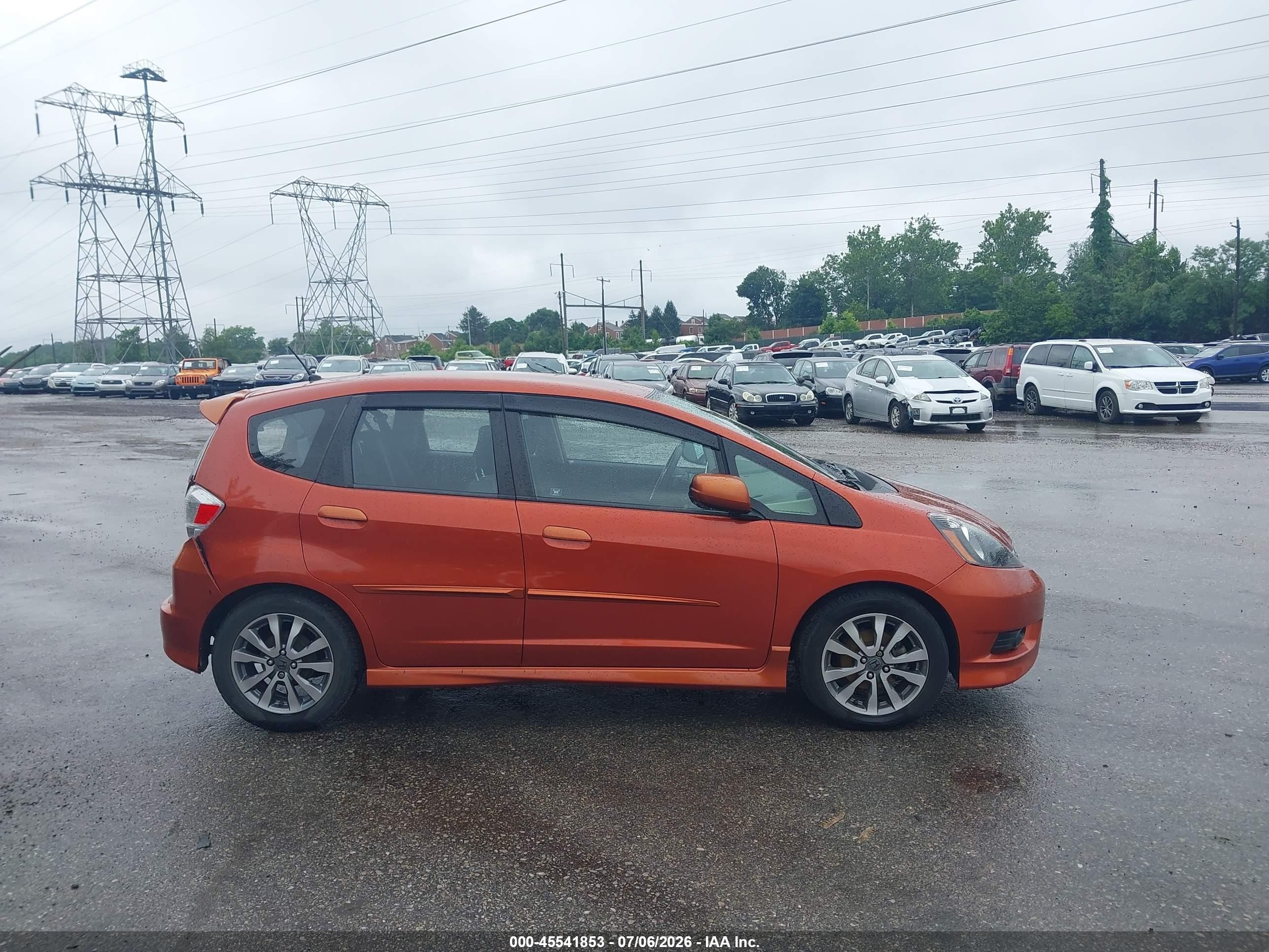 2012 Honda Fit Sport Orange vin: JHMGE8H68CC033384